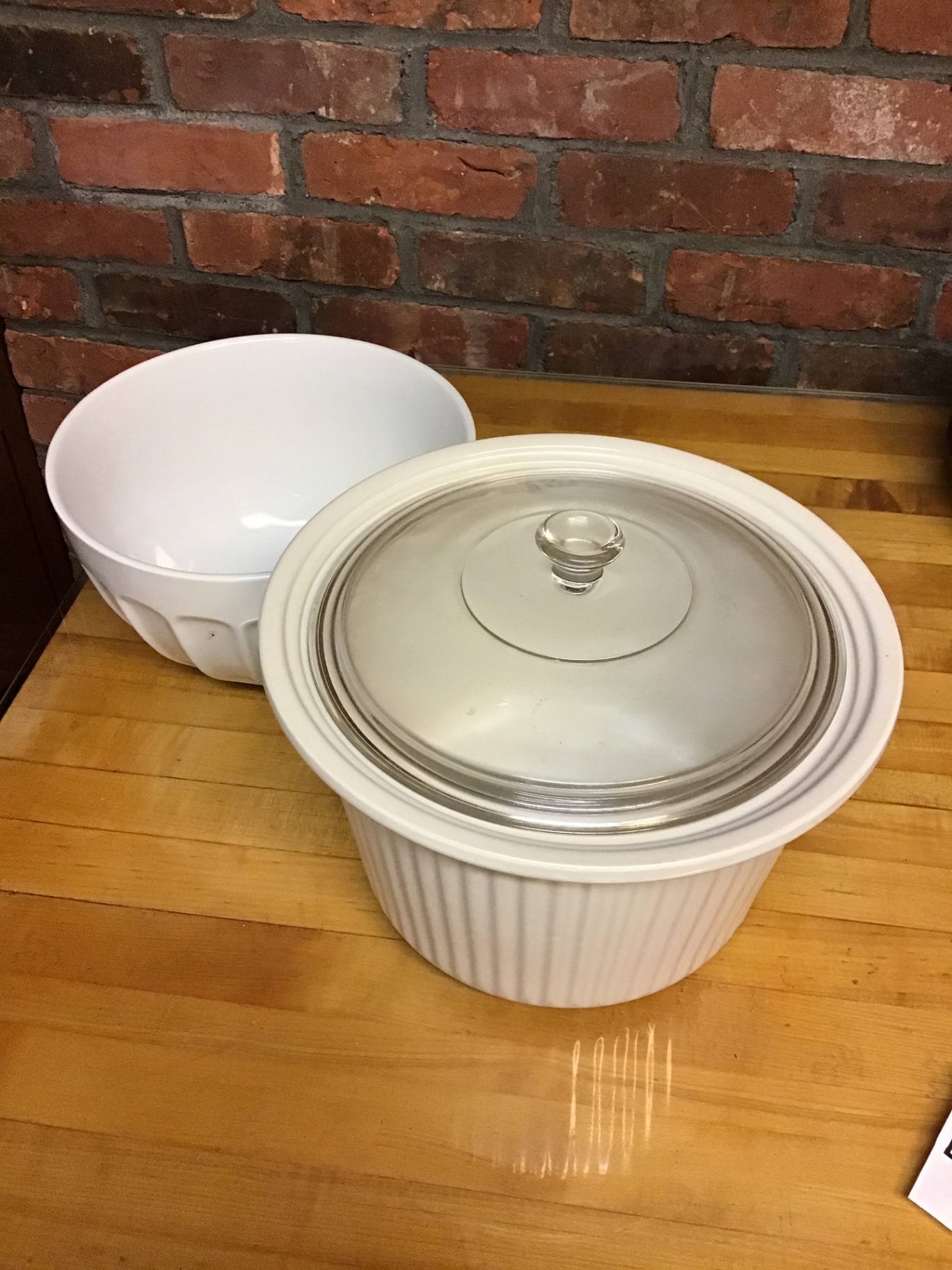 White ceramic bowl and covered ribbed casserole dish - image 1 of 1