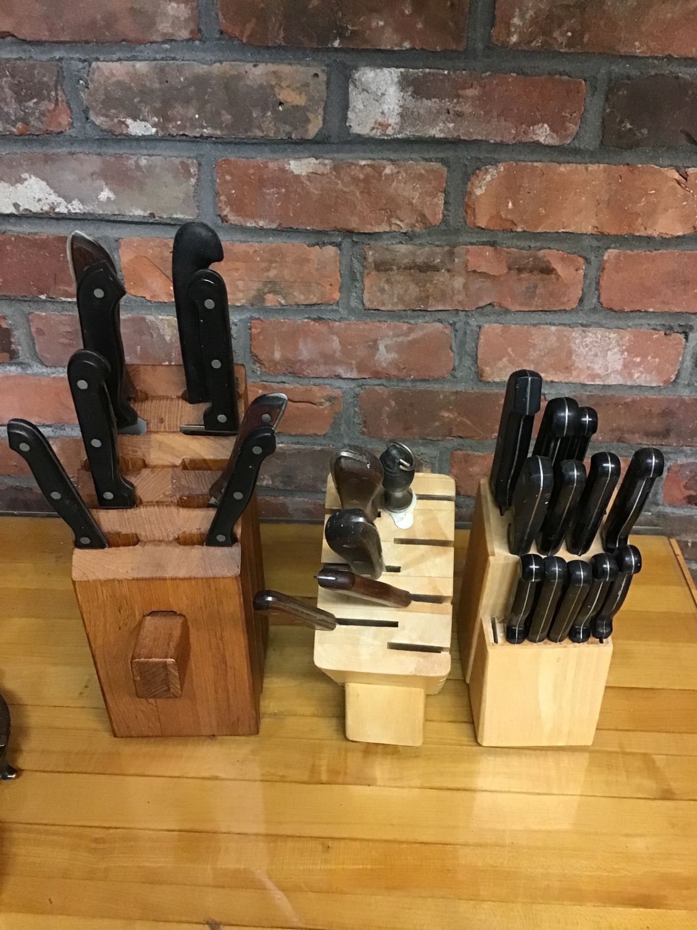 Three wooden knife blocks with assorted kitchen knives - image 1 of 1