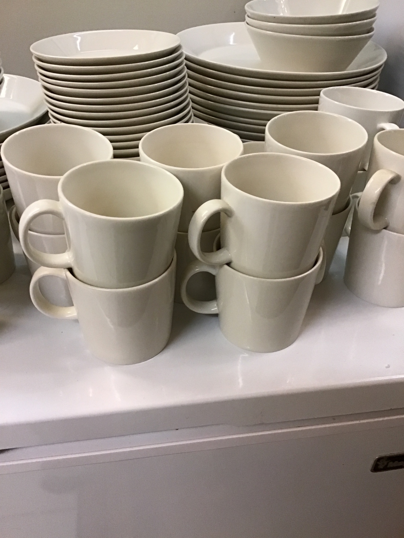 White ceramic dinnerware set (plates, bowls, mugs) - image 2 of 3