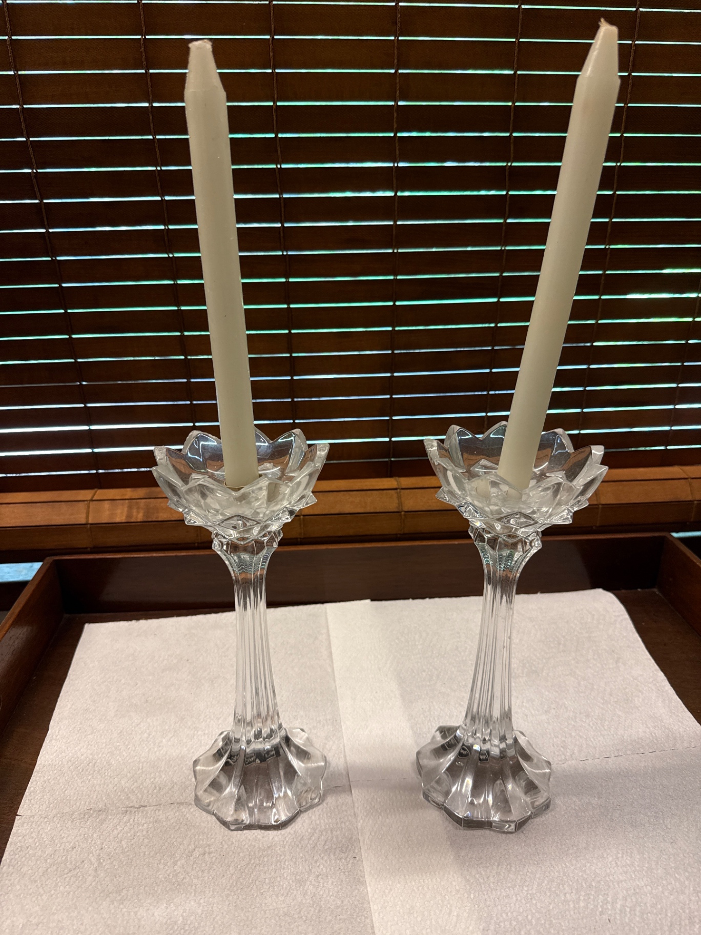 Crystal candlestick pair with taper candles - image 1 of 2