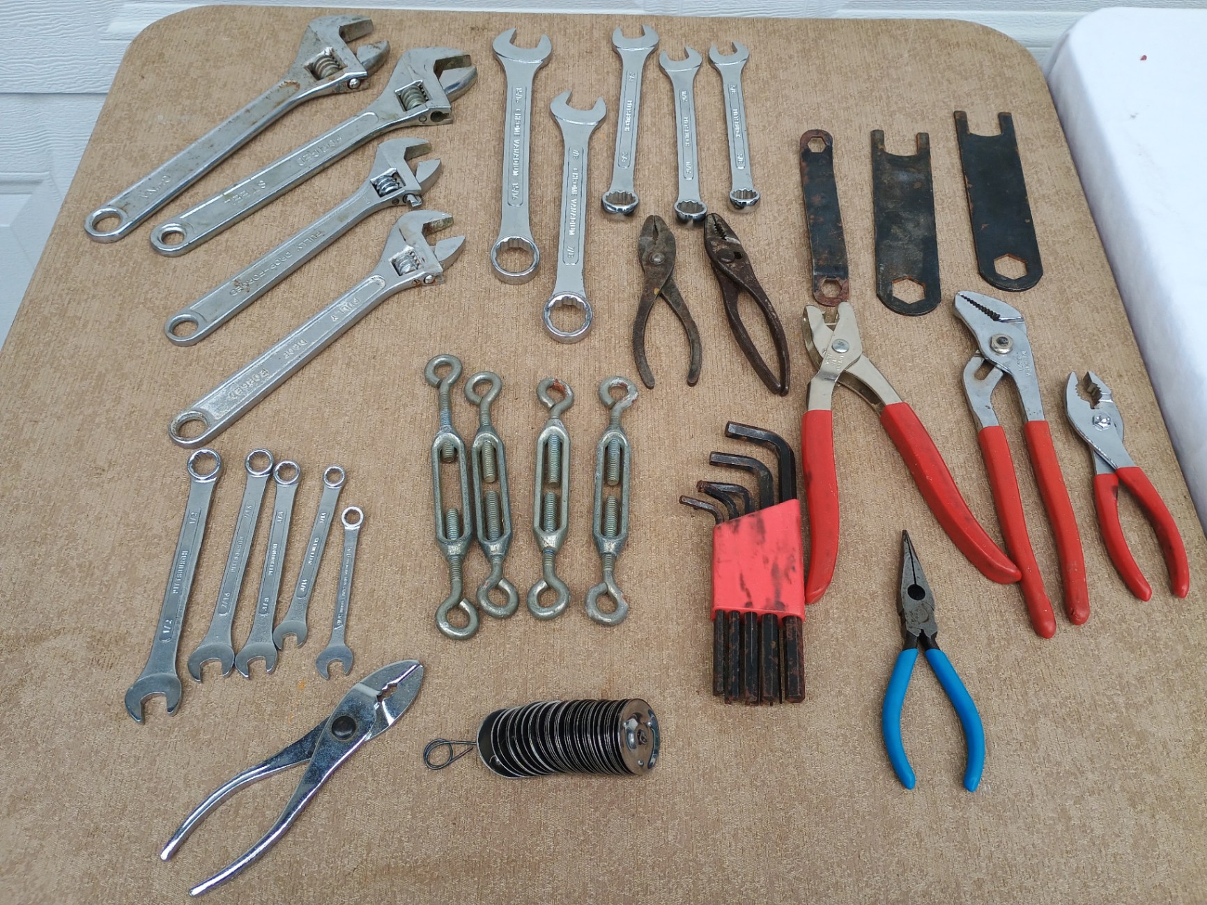 Assorted hand tools including wrenches, pliers and cutters - image 1 of 4