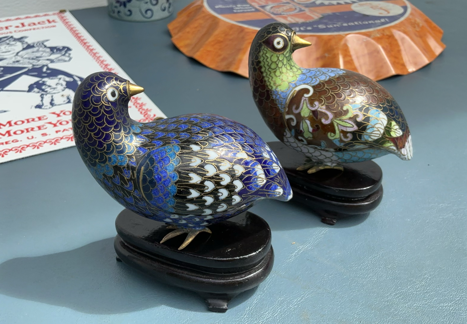 Vintage advertising signs, cloisonne bird figurines, and mug - image 5 of 6
