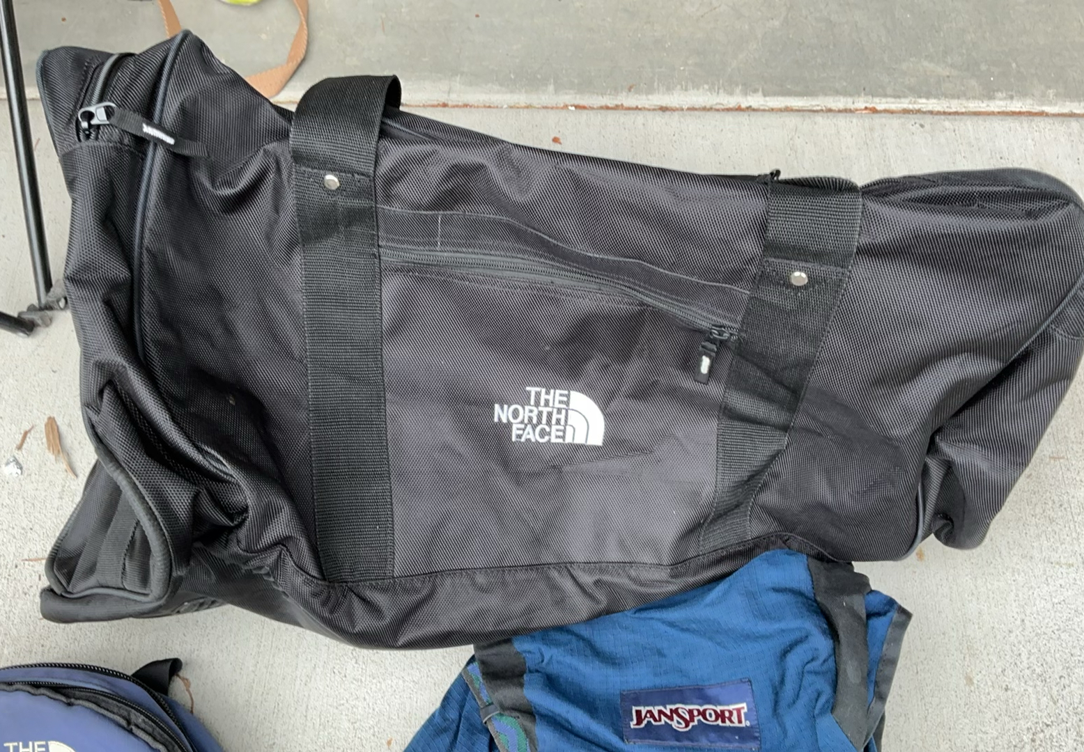 Assorted North Face outdoor backpacks and a duffel bag - image 3 of 5