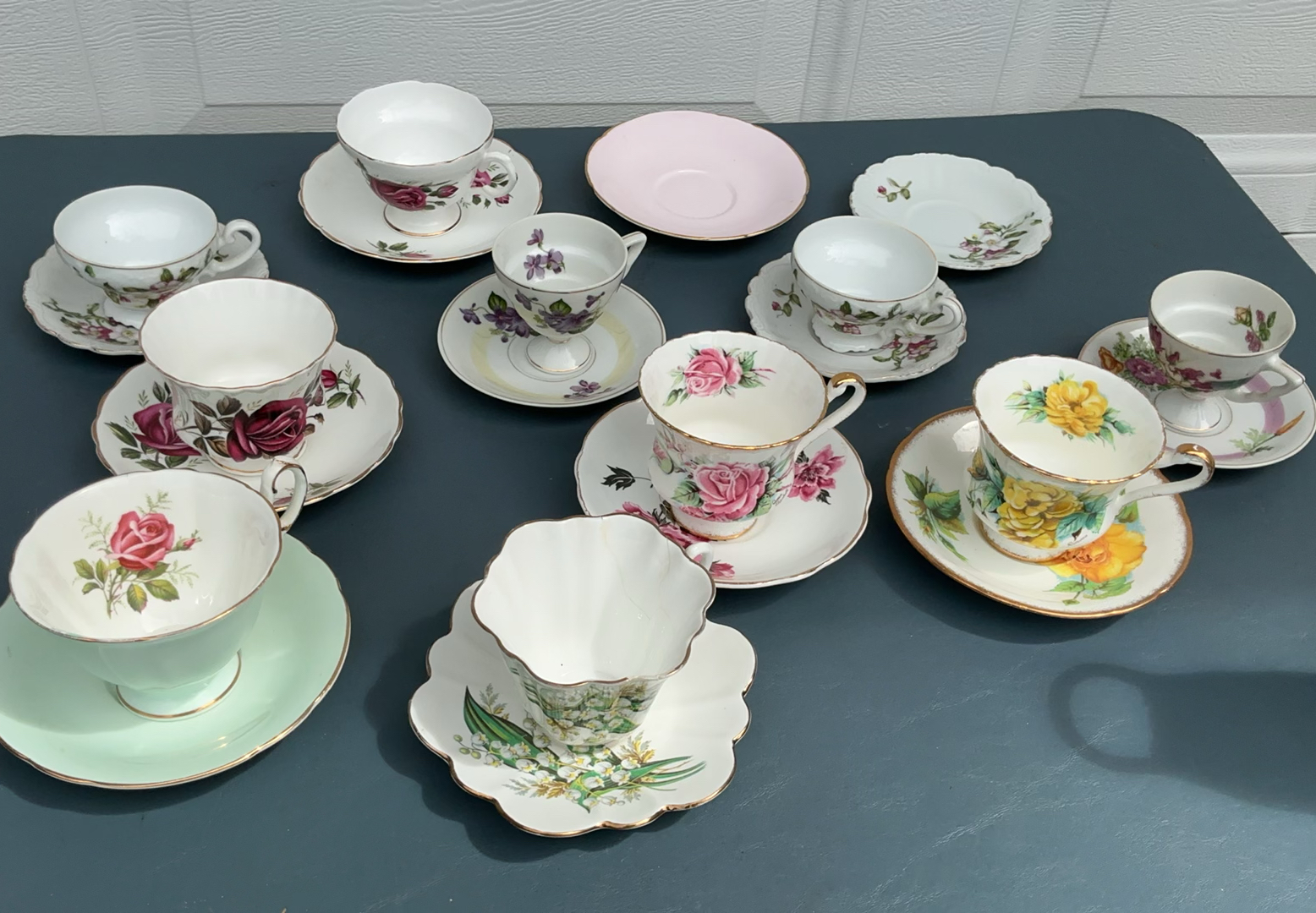 Vintage Porcelain Tea Cups And Saucers - image 1 of 11