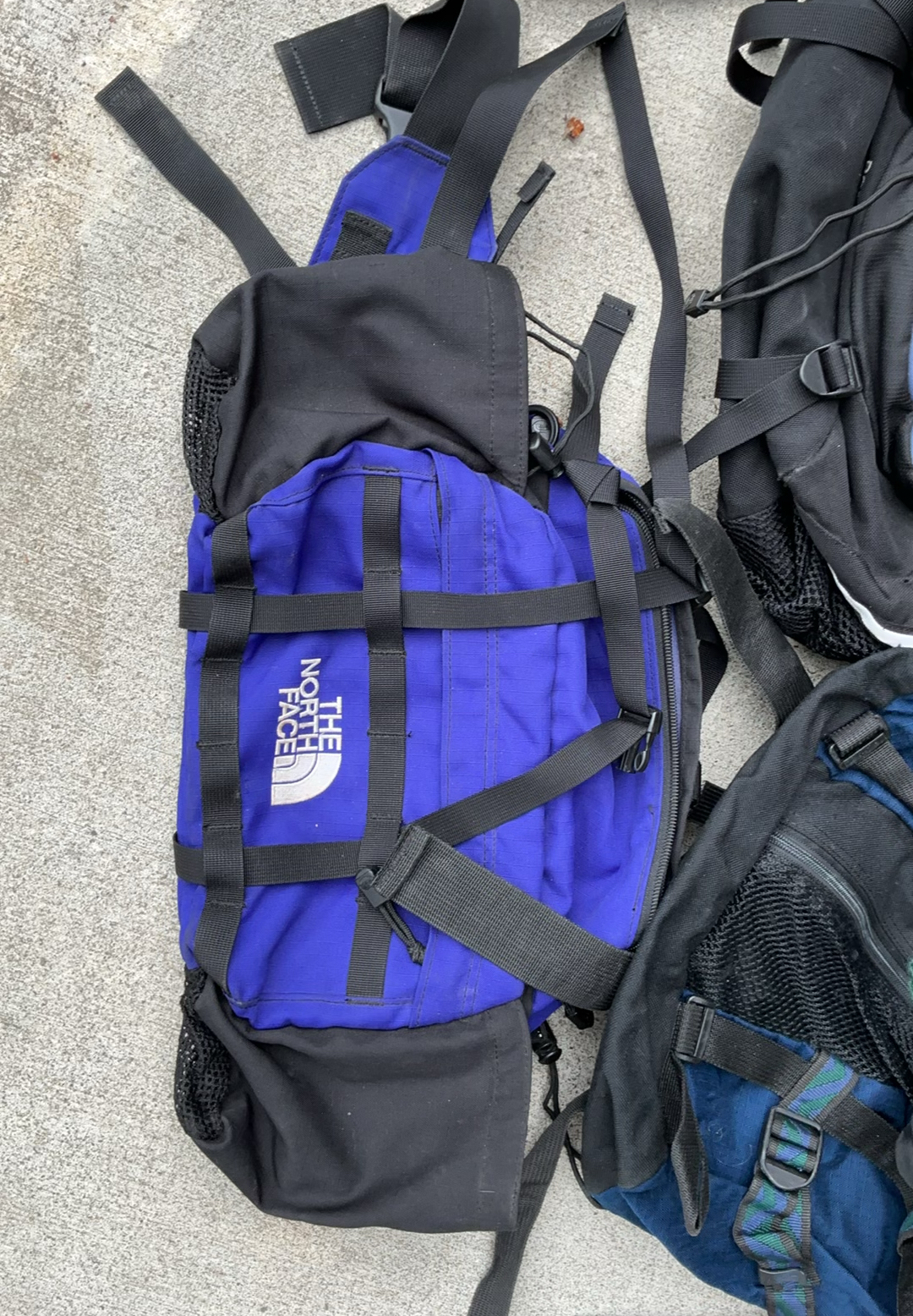Assorted North Face outdoor backpacks and a duffel bag - image 5 of 5
