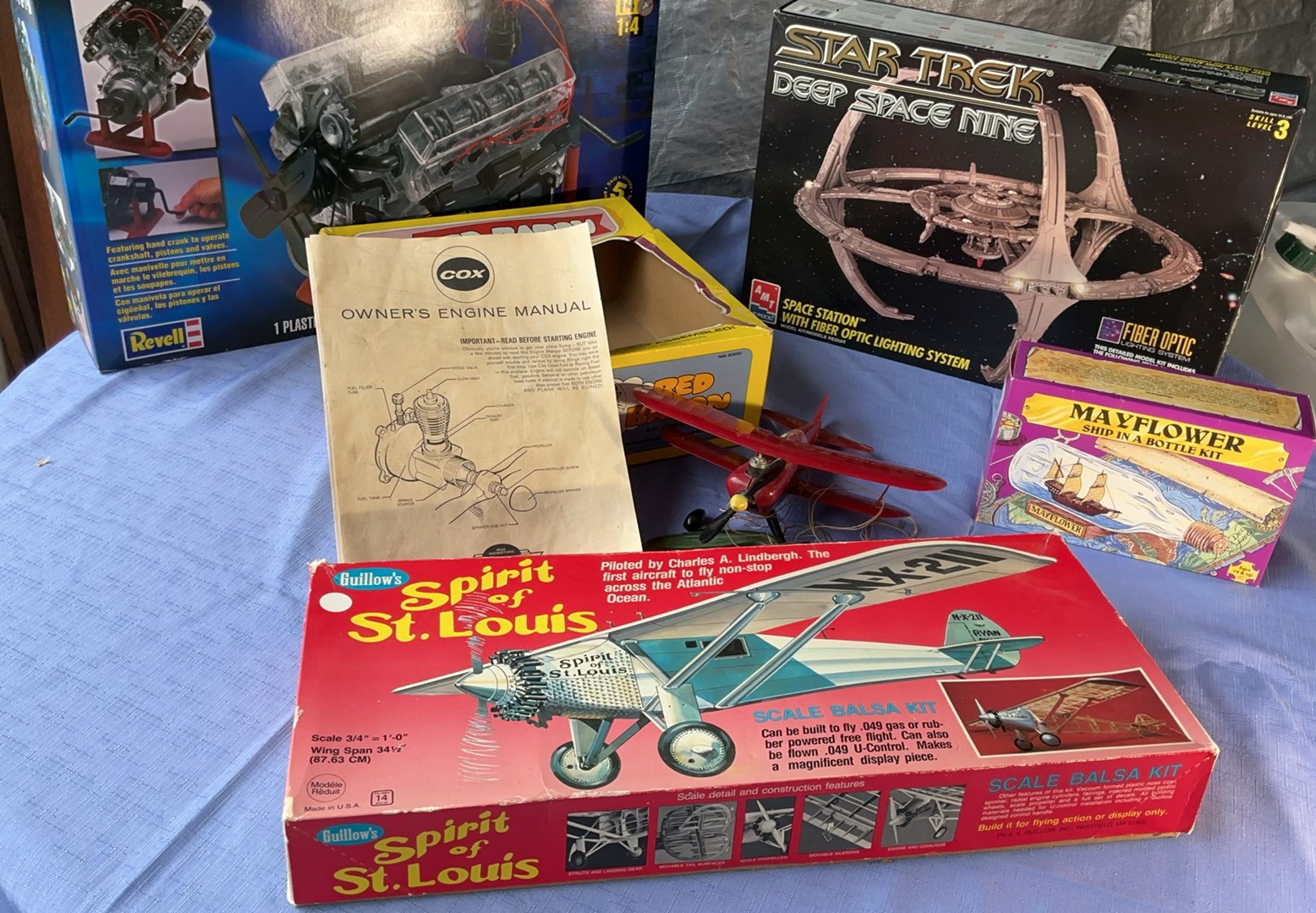 Collection of vintage model kits and engine parts - image 1 of 7