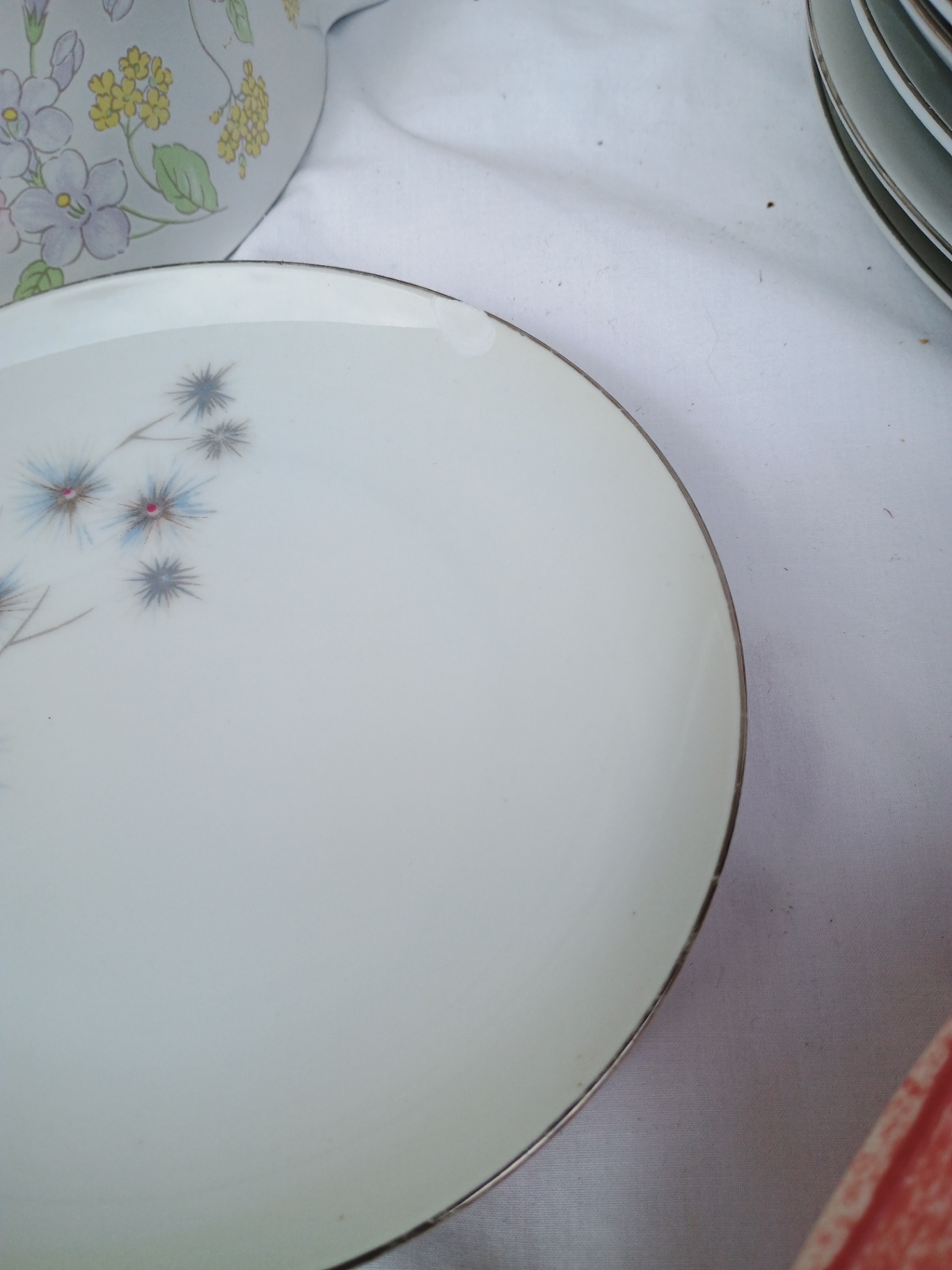 Assorted porcelain dinnerware with floral patterns and serving pieces - image 11 of 12