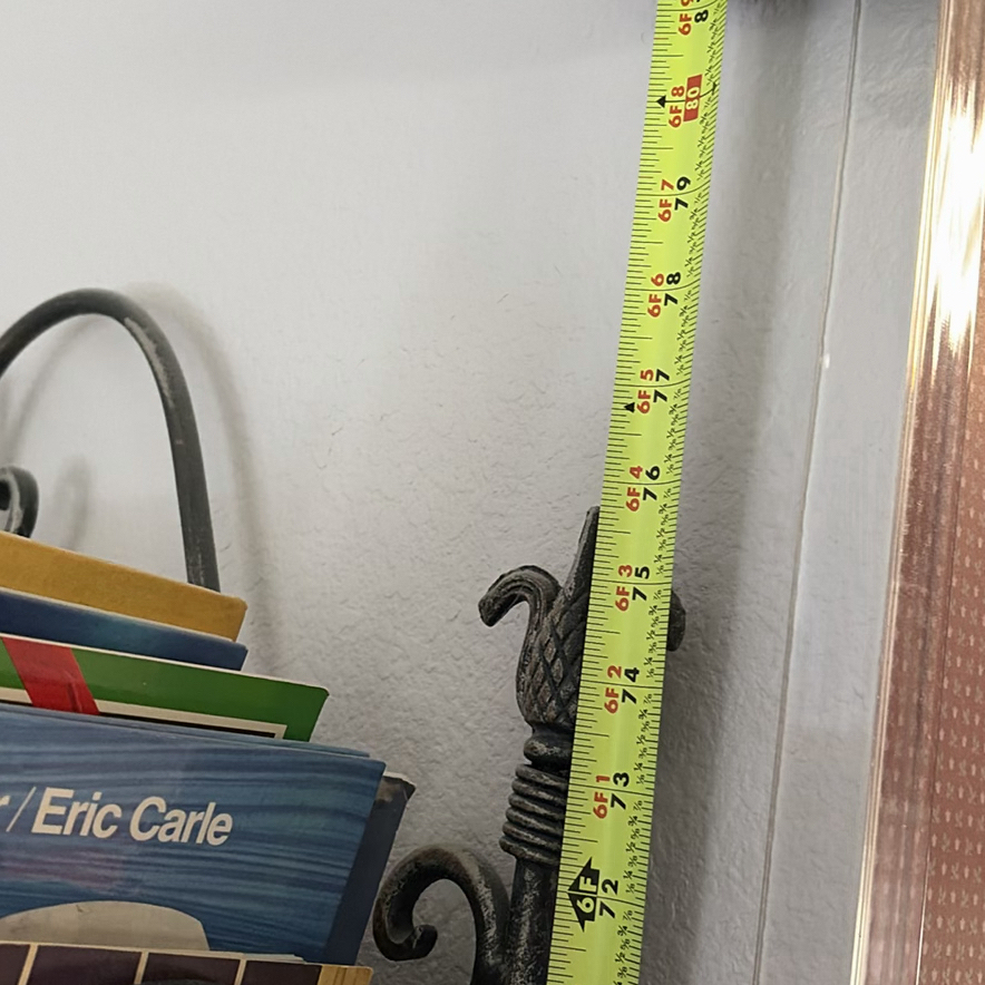 Metal and Wicker Shelving Unit with Books and Decorative Items - image 12 of 19