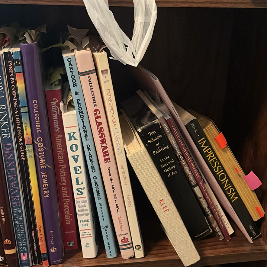Wooden Bookshelf with Books, Binders, and Decorative Items - image 7 of 12