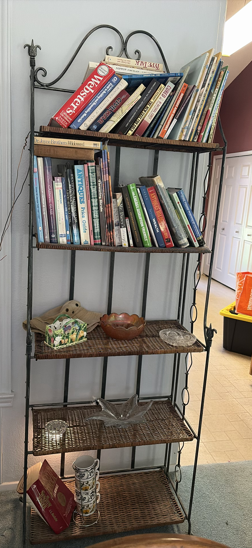 Metal and Wicker Shelving Unit with Books and Decorative Items - image 1 of 19
