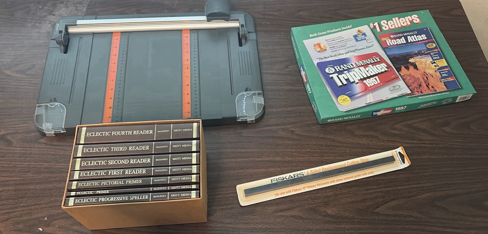 Fiskars Paper Trimmer, Table, McGuffey Reader Book Set, Rand McNally TripMaker 1997, and Cutting Strip - image 1 of 6