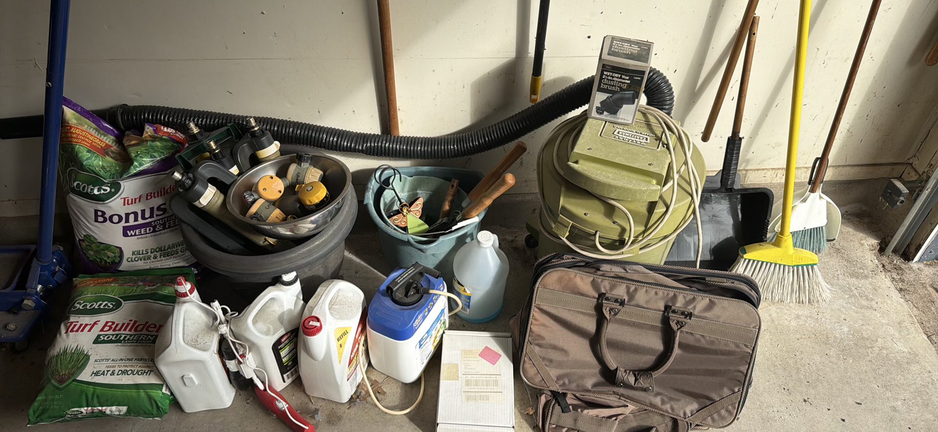 Scotts lawn care products, garden watering accessories, and assorted yard tools - image 1 of 9