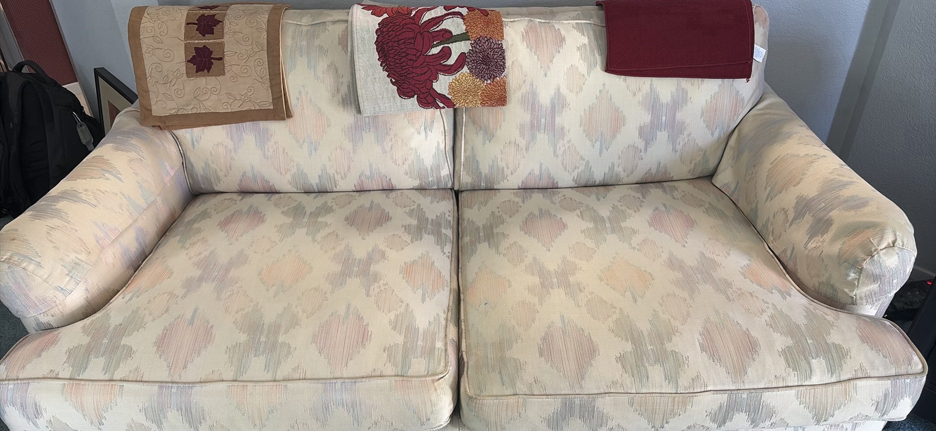 Patterned Two-Seat Sofa with Decorative Throws - image 1 of 4