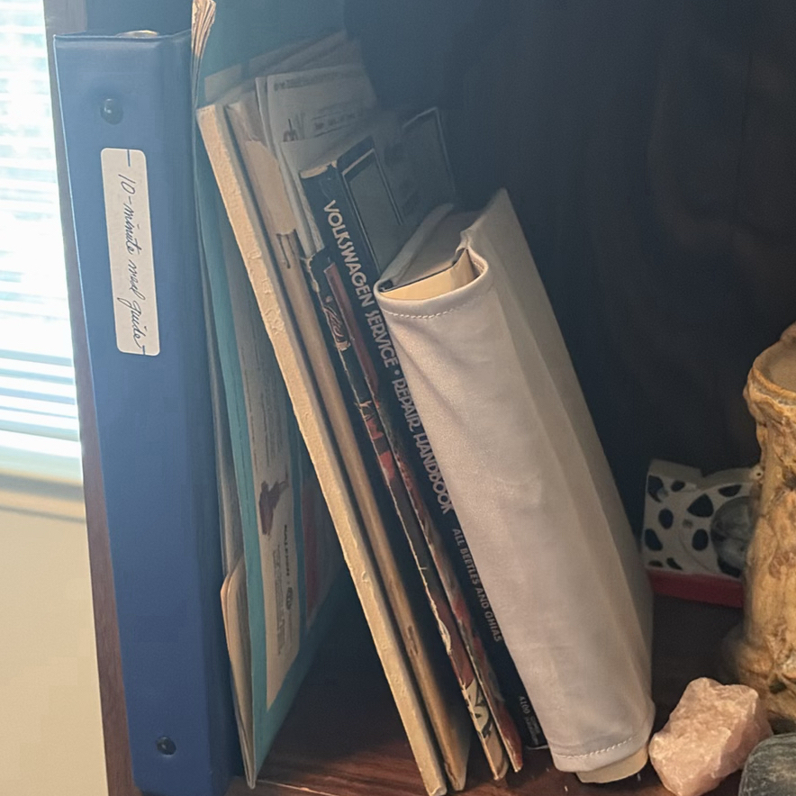 Wooden Bookshelf with Books, Binders, and Decorative Items - image 2 of 12