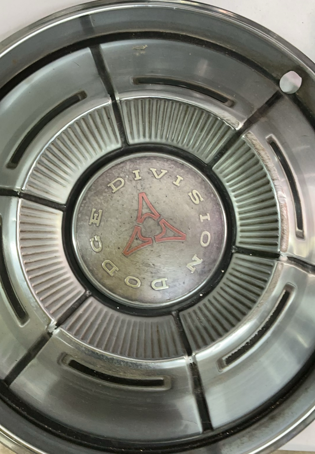 Vintage chrome car hubcaps and grille pieces - image 2 of 8