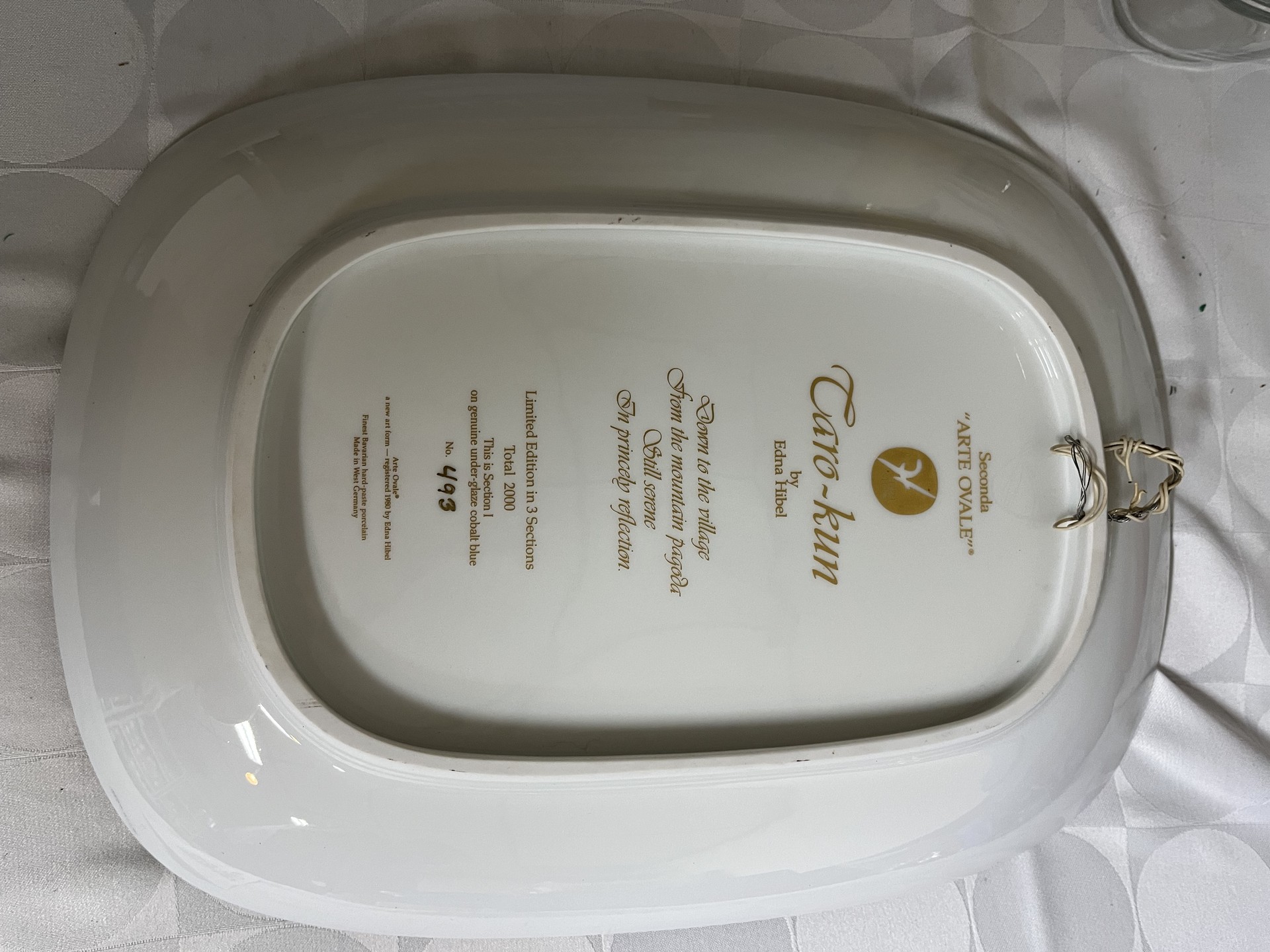Decorative ceramic plate with religious icon and gold detailing - image 2 of 3