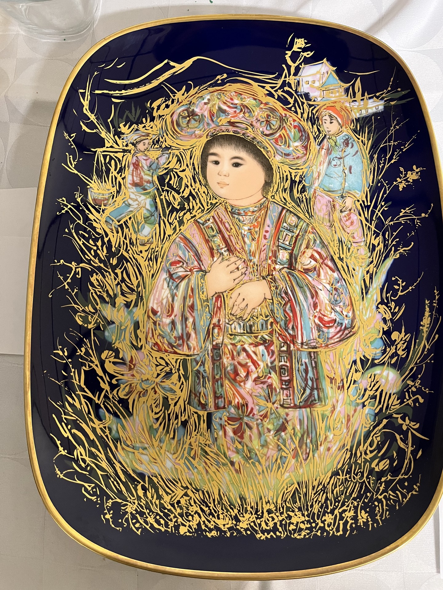 Decorative ceramic plate with religious icon and gold detailing - image 1 of 3