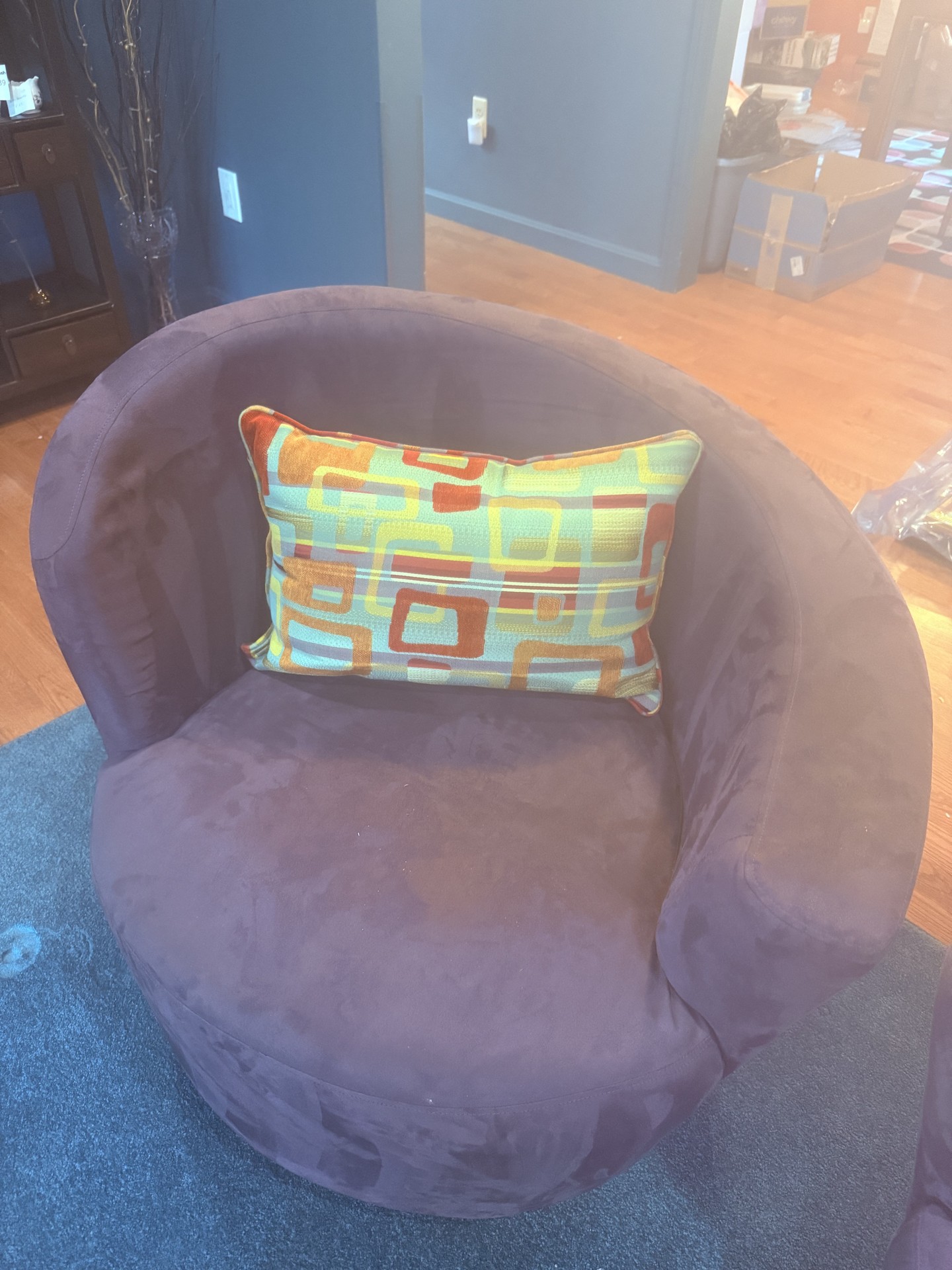 Purple circular lounge chairs with colorful pillows - image 4 of 8