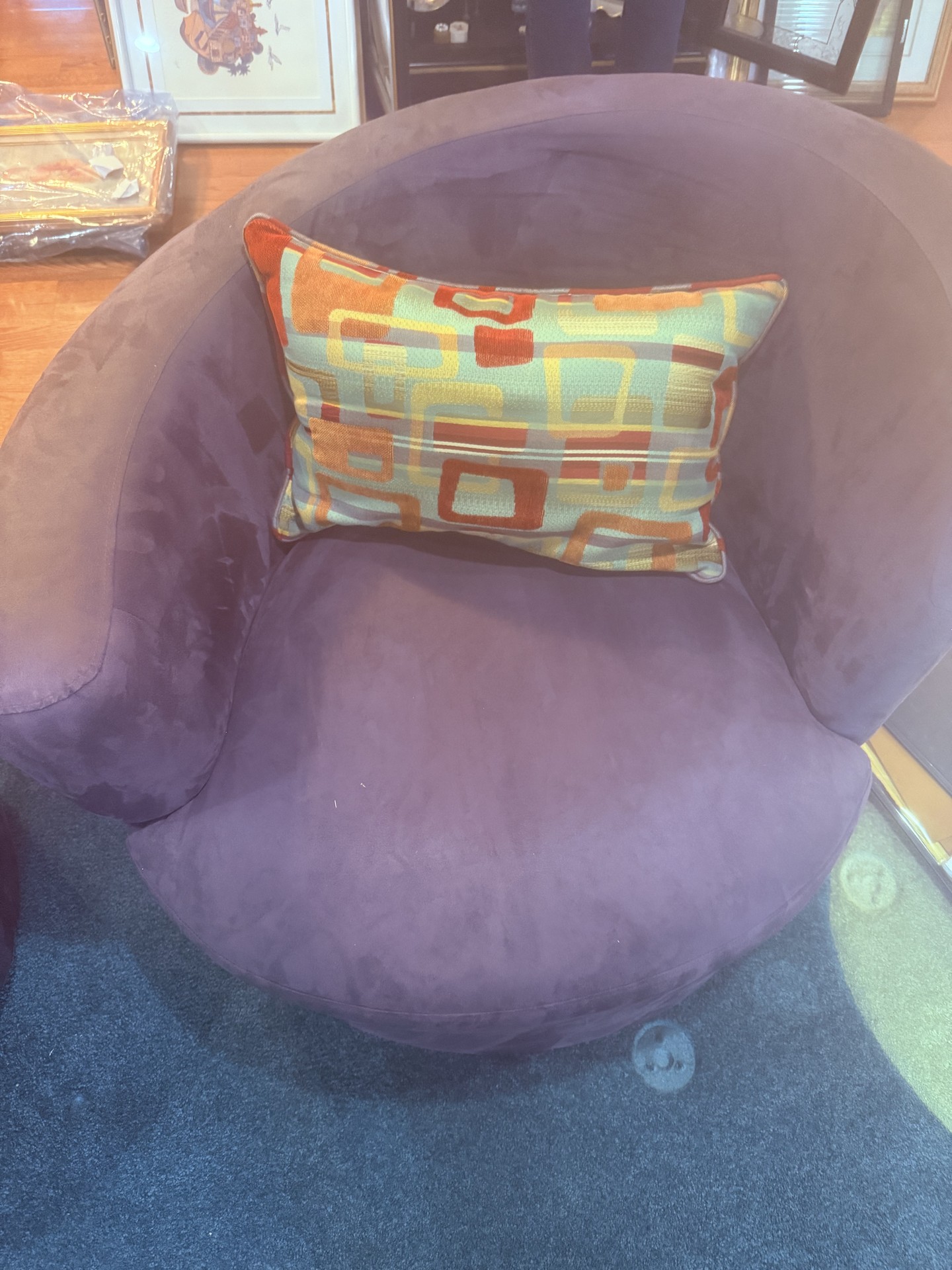 Purple circular lounge chairs with colorful pillows - image 5 of 8