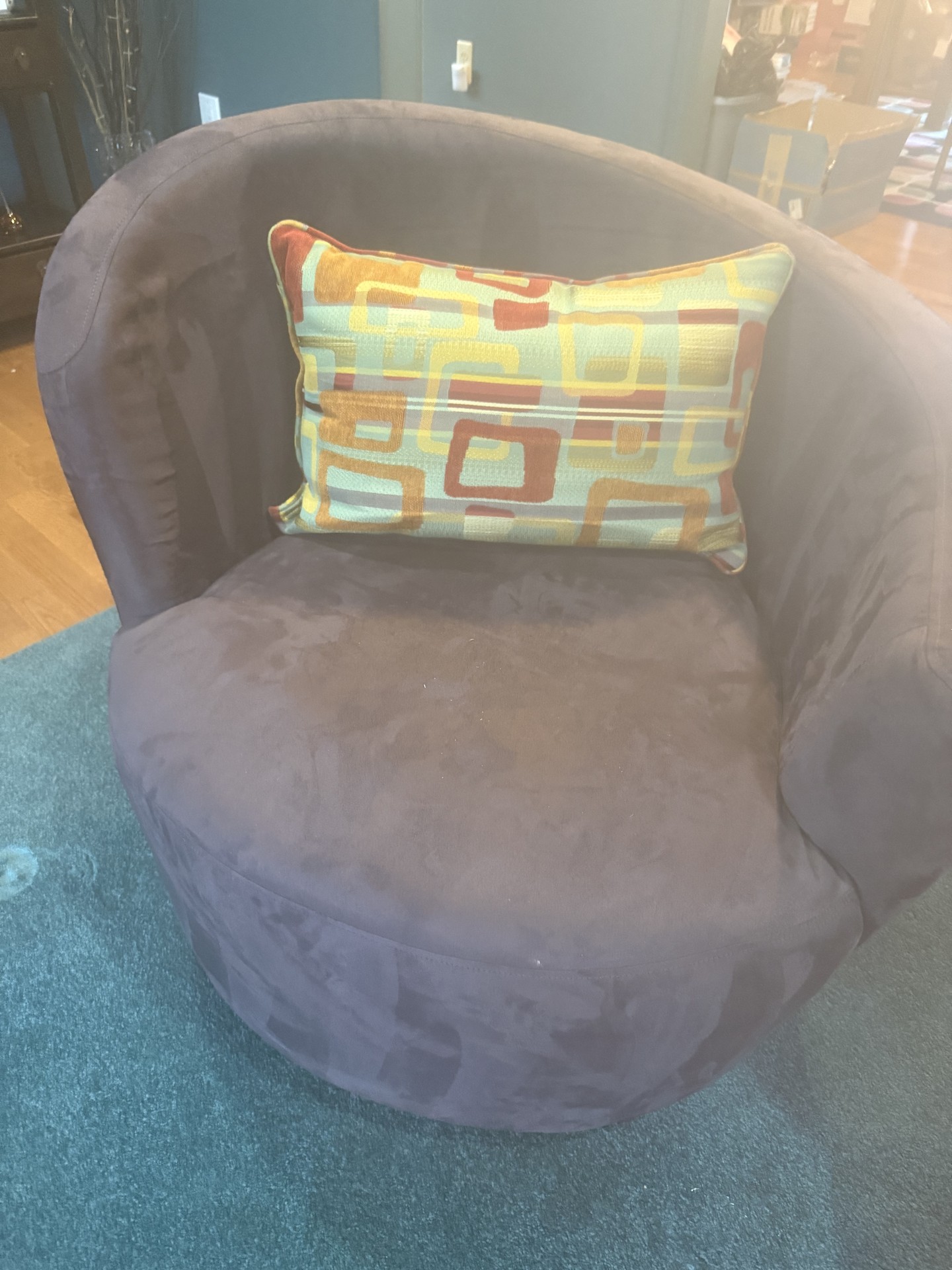 Purple circular lounge chairs with colorful pillows - image 3 of 8
