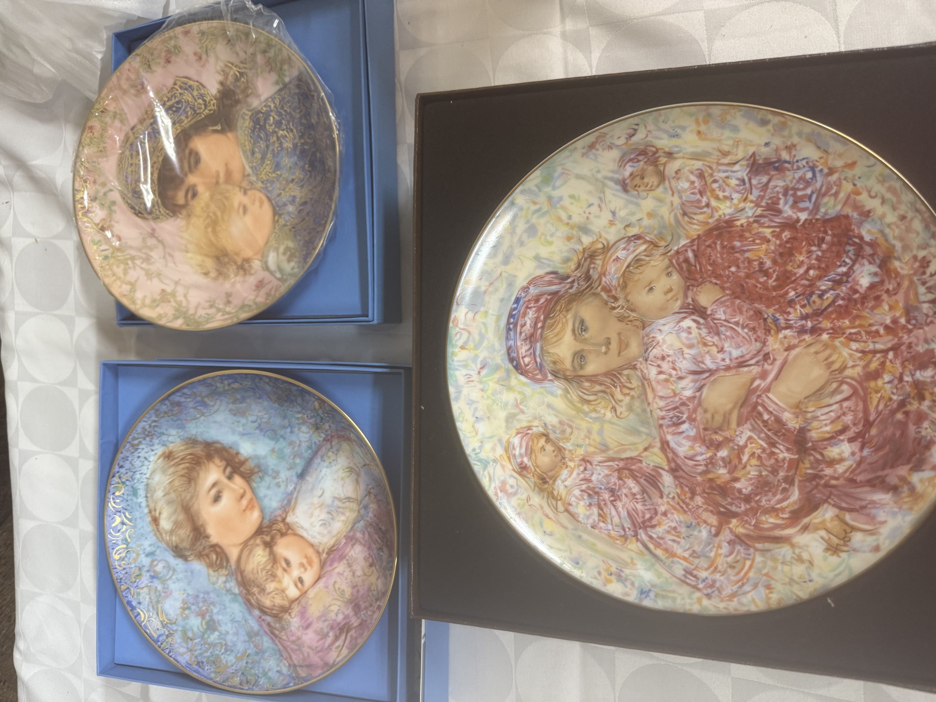 Three decorative porcelain plates with vintage artwork - image 1 of 11