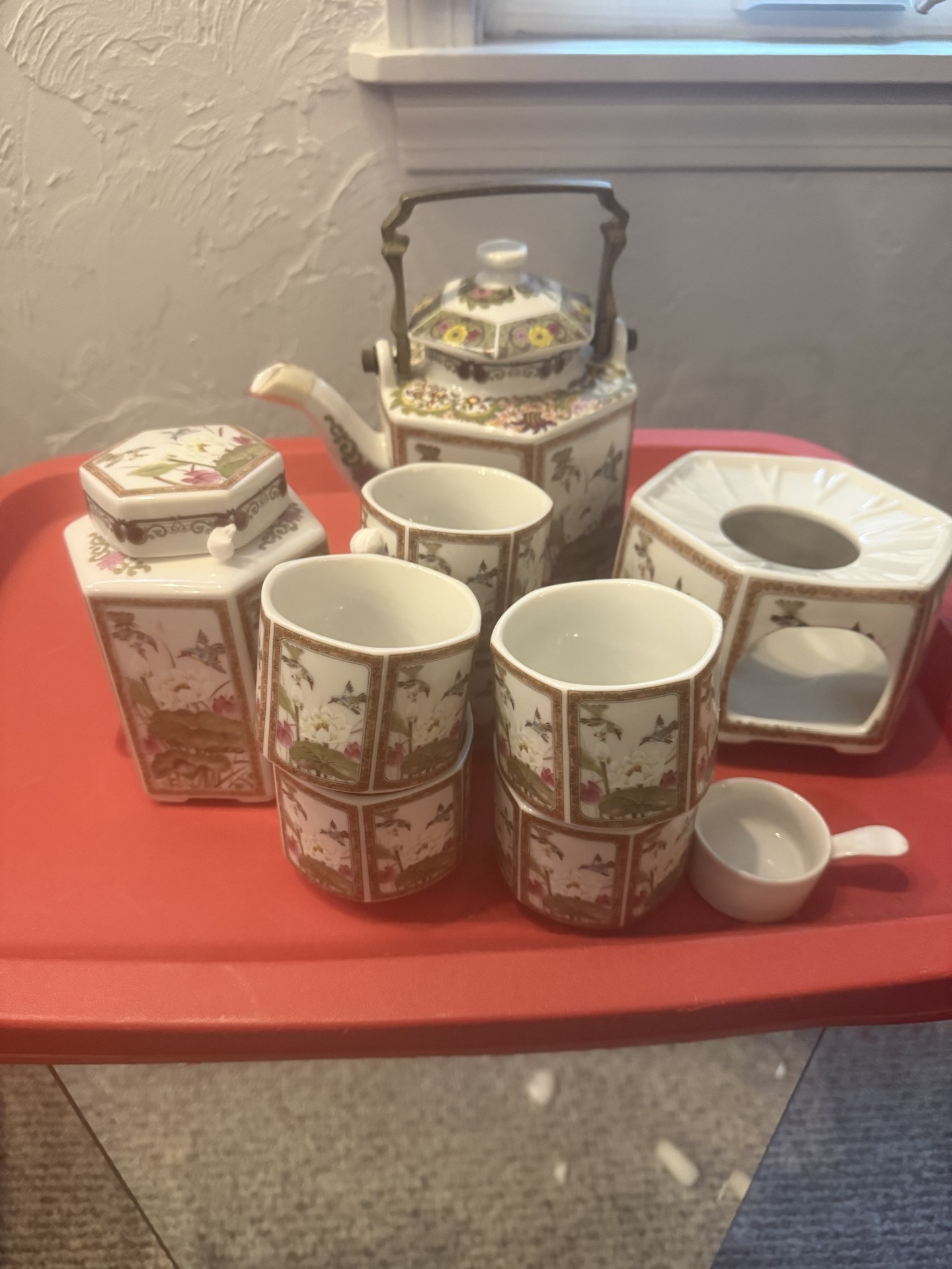 Japanese-style ceramic tea set with teapot, cups, and accessories - image 1 of 6