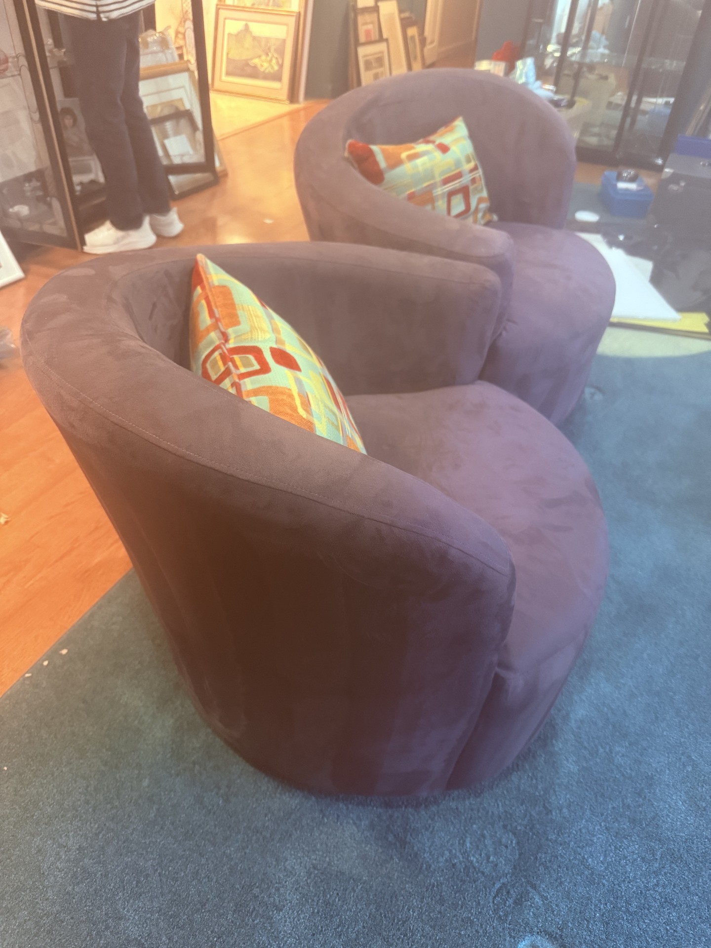 Purple circular lounge chairs with colorful pillows - image 6 of 8