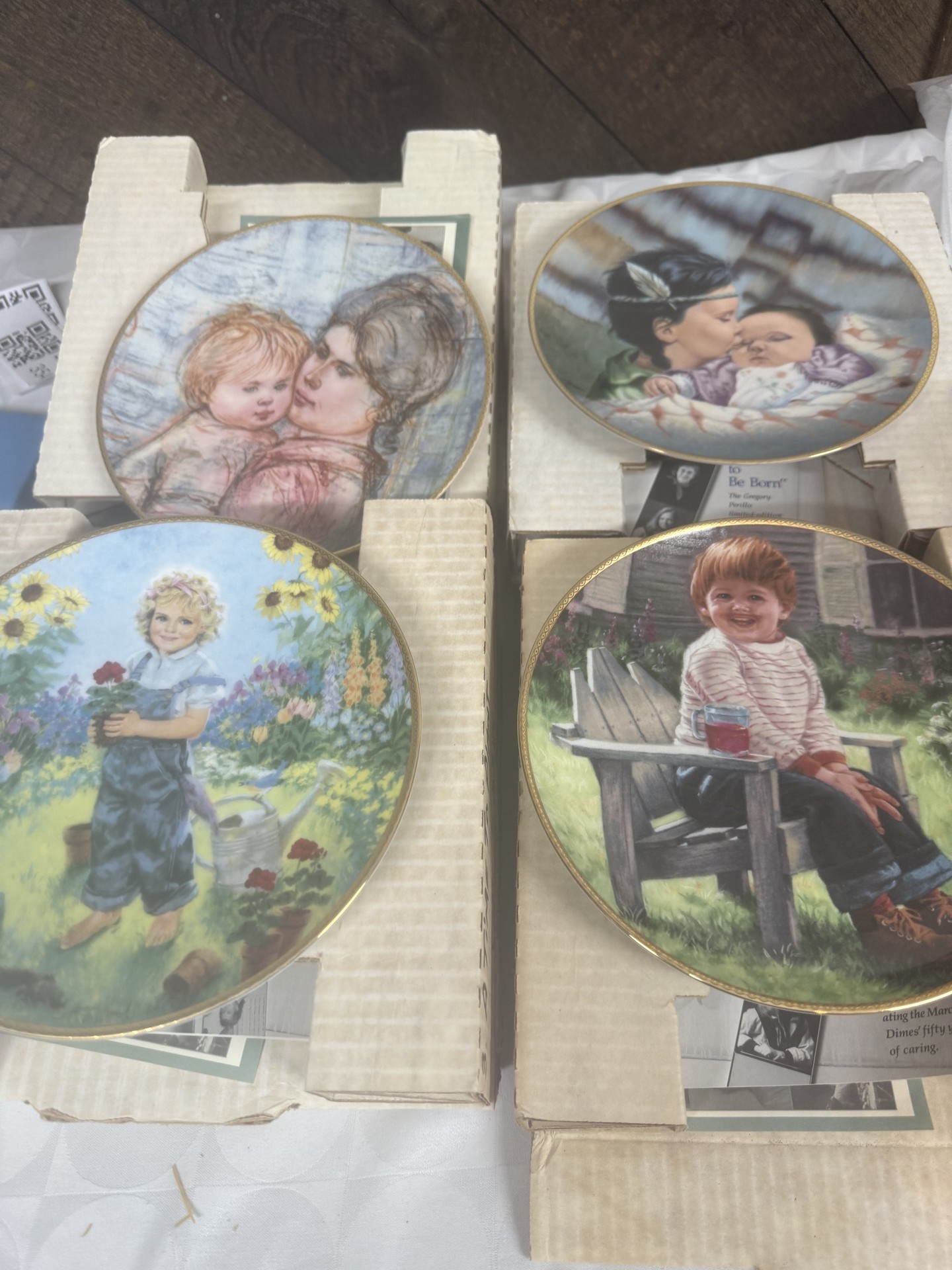 Limited-edition round collector plates featuring children with Certificates of Authenticity - image 1 of 14