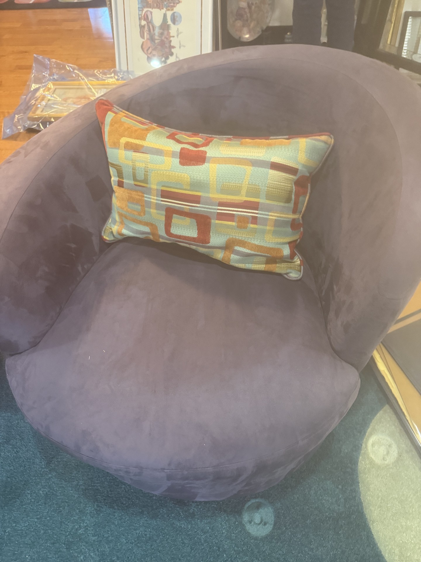 Purple circular lounge chairs with colorful pillows - image 2 of 8