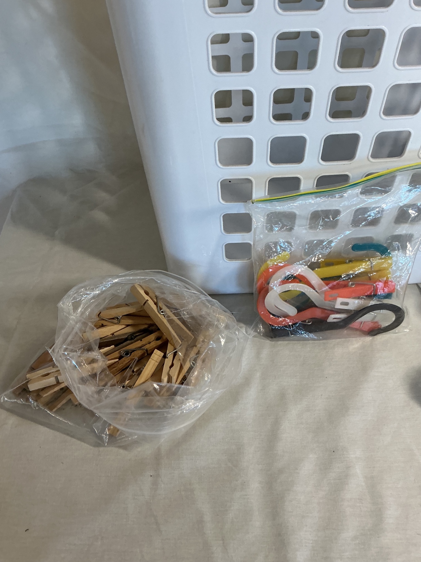 White plastic laundry hamper with lid and assorted craft materials - image 2 of 4