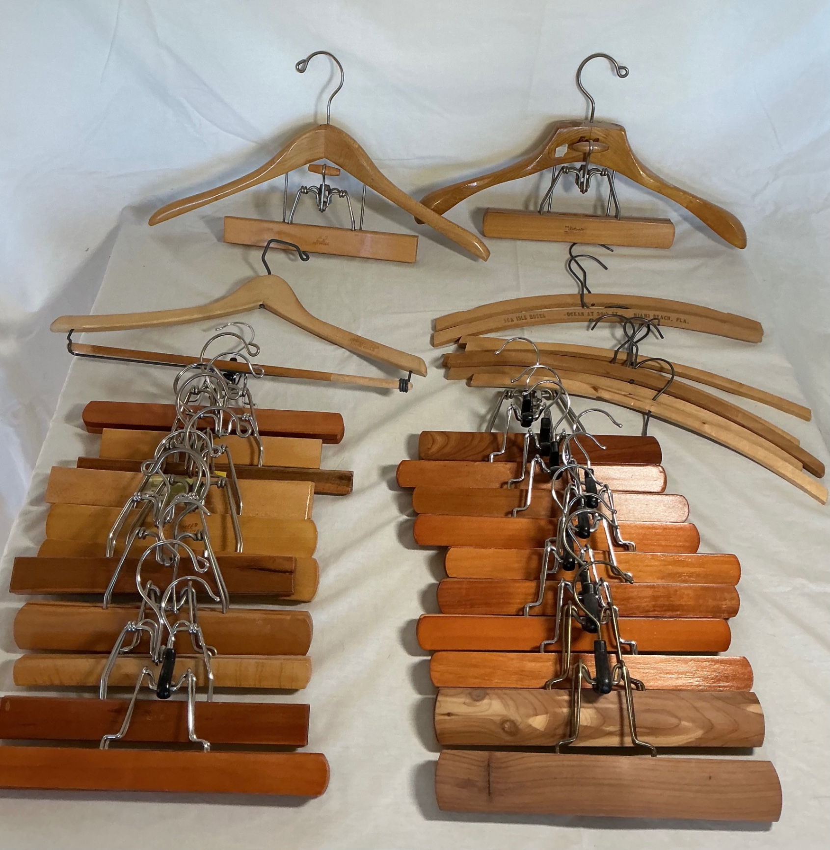 Assorted wooden clothes hangers - image 1 of 5