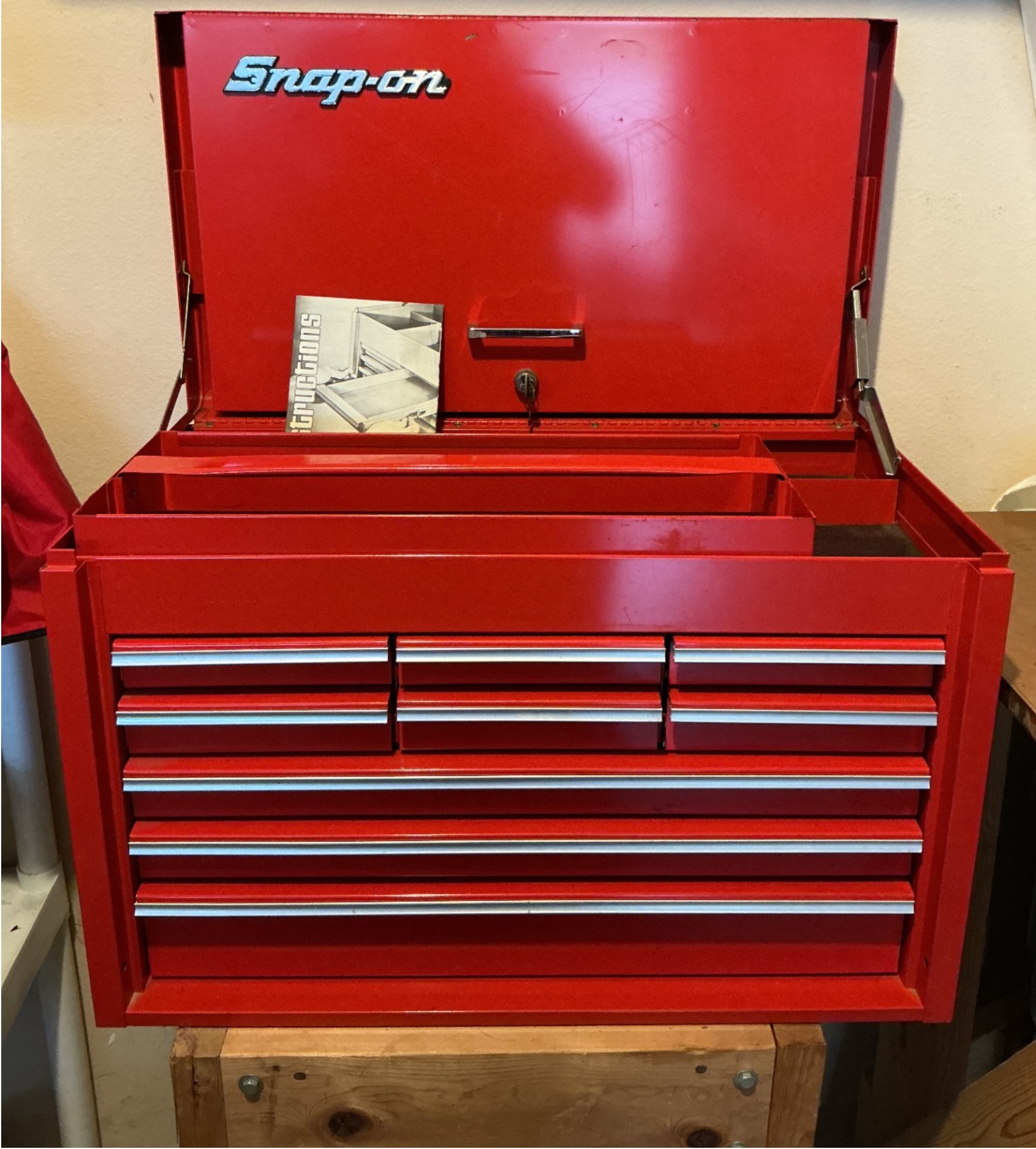 Snap-on red tool chest with drawers and assorted hand tools - image 1 of 10