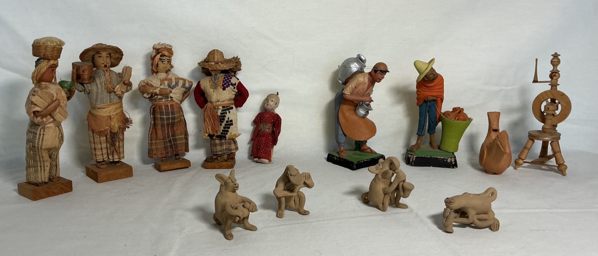 Collection of Folk Art Figurines and Clay Figures - image 1 of 6