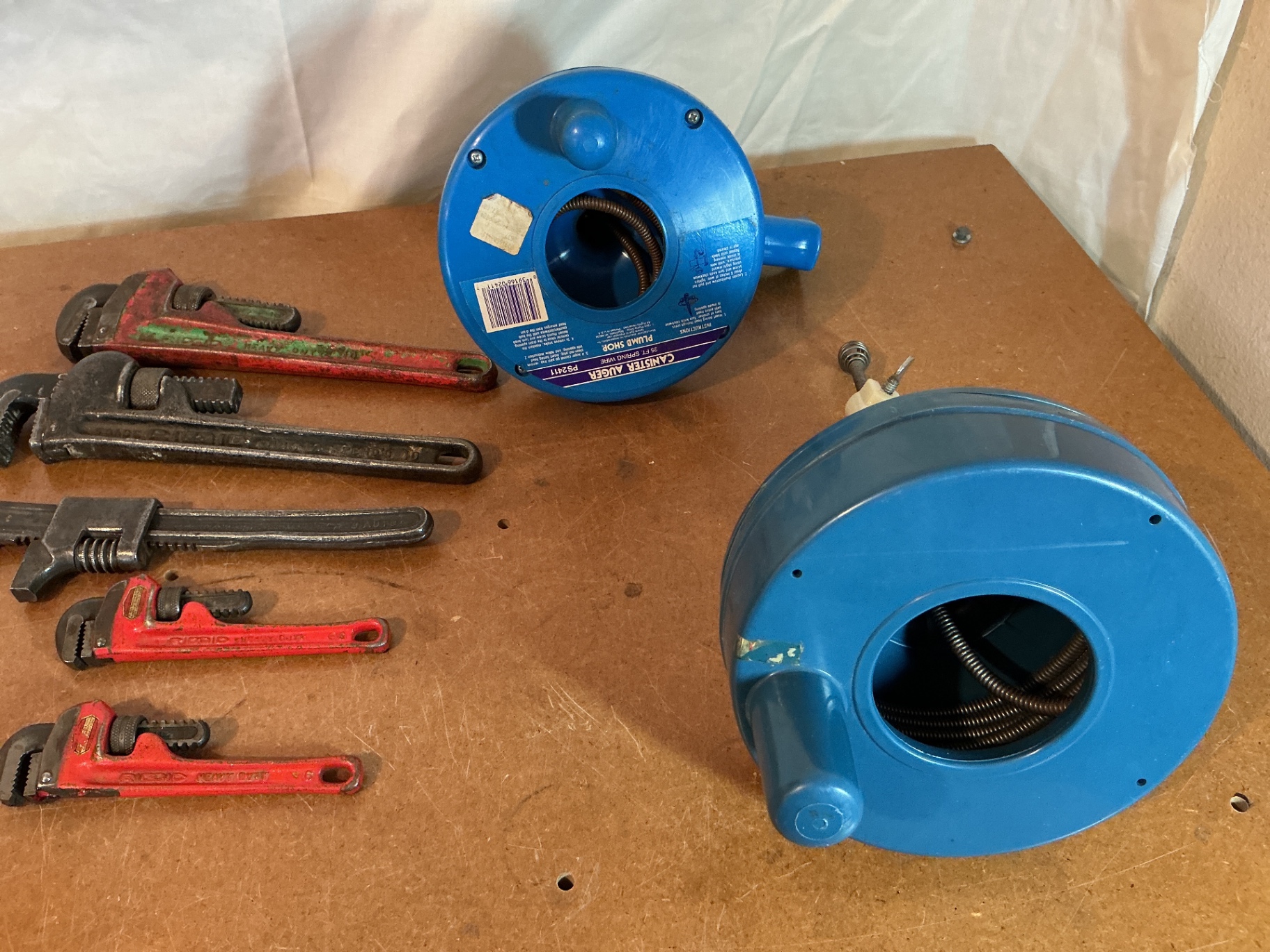 Assorted hose clamps, wrenches, and blue hose reels - image 3 of 3
