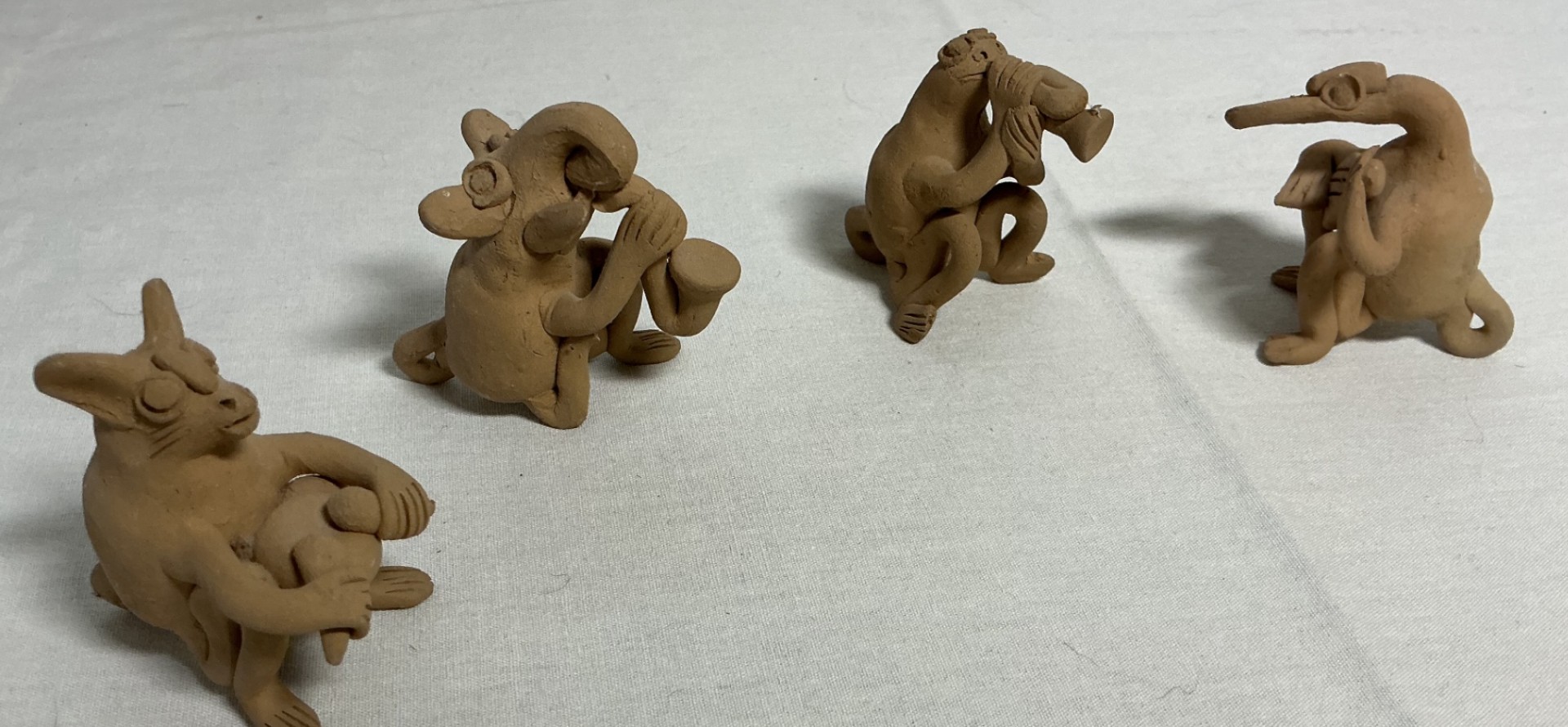 Collection of Folk Art Figurines and Clay Figures - image 4 of 6