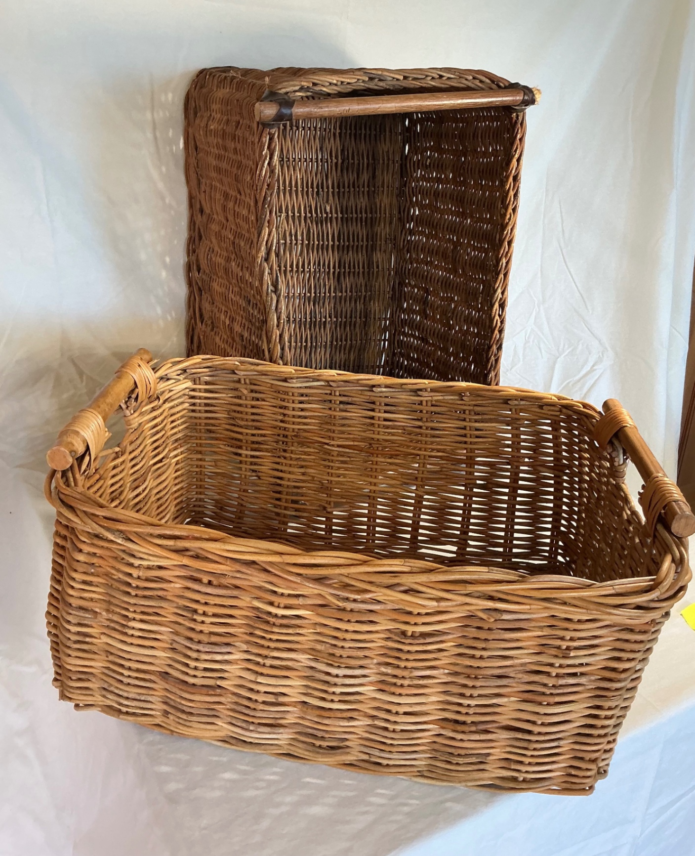 Set of two woven wicker storage baskets - image 1 of 3