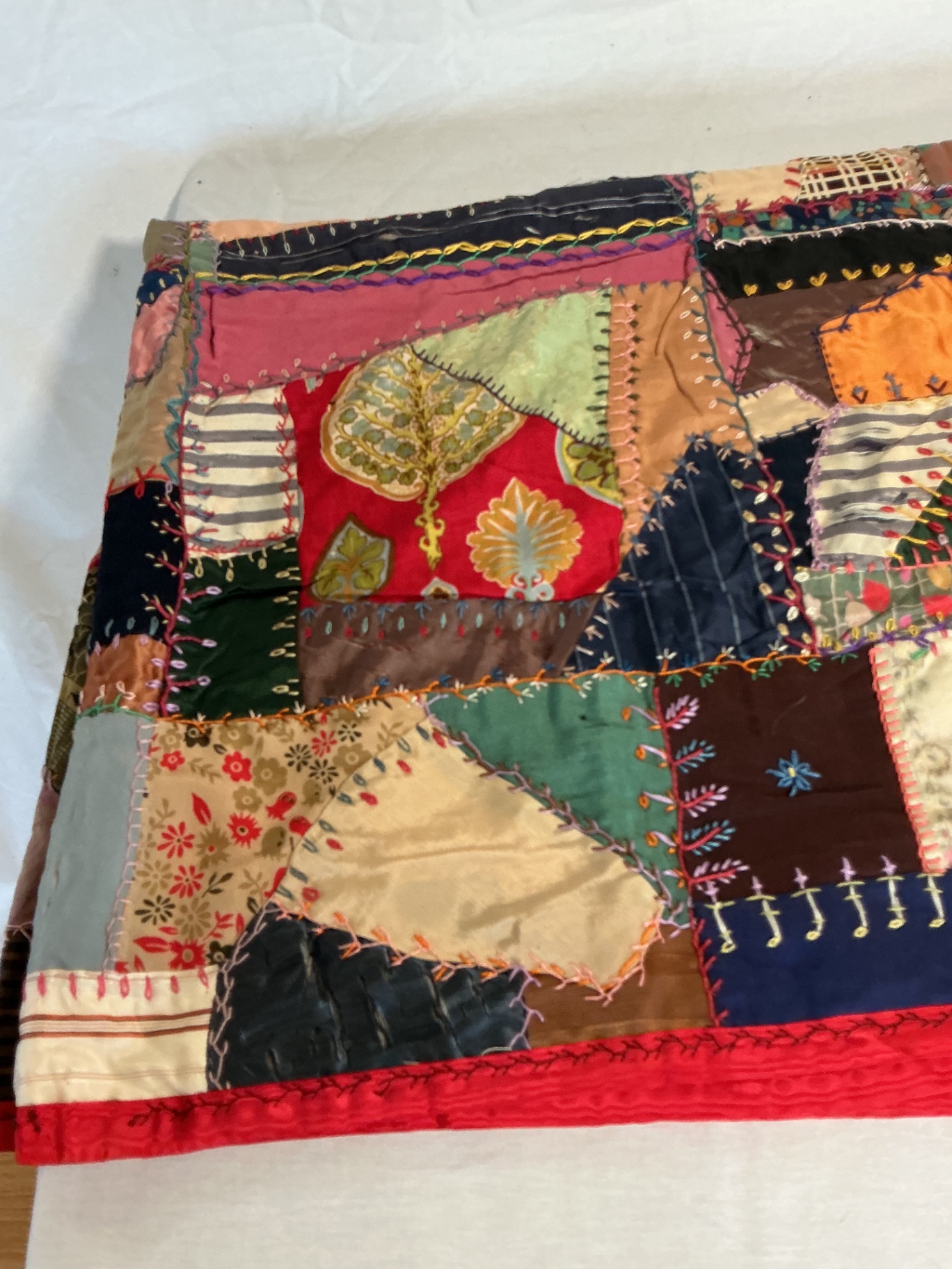 Antique silk patchwork quilt with embroidery. - image 10 of 14