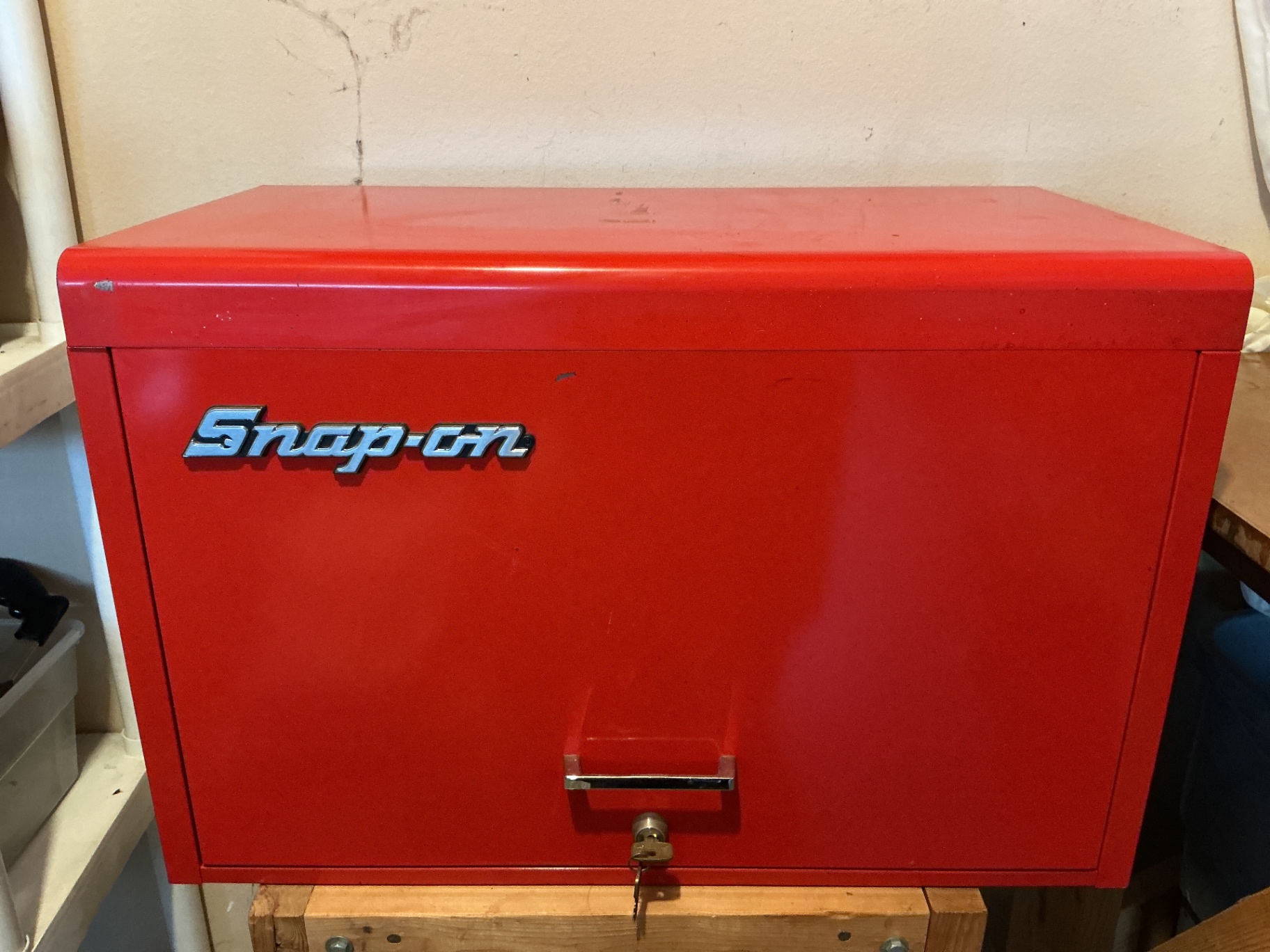 Snap-on red tool chest with drawers and assorted hand tools - image 9 of 10