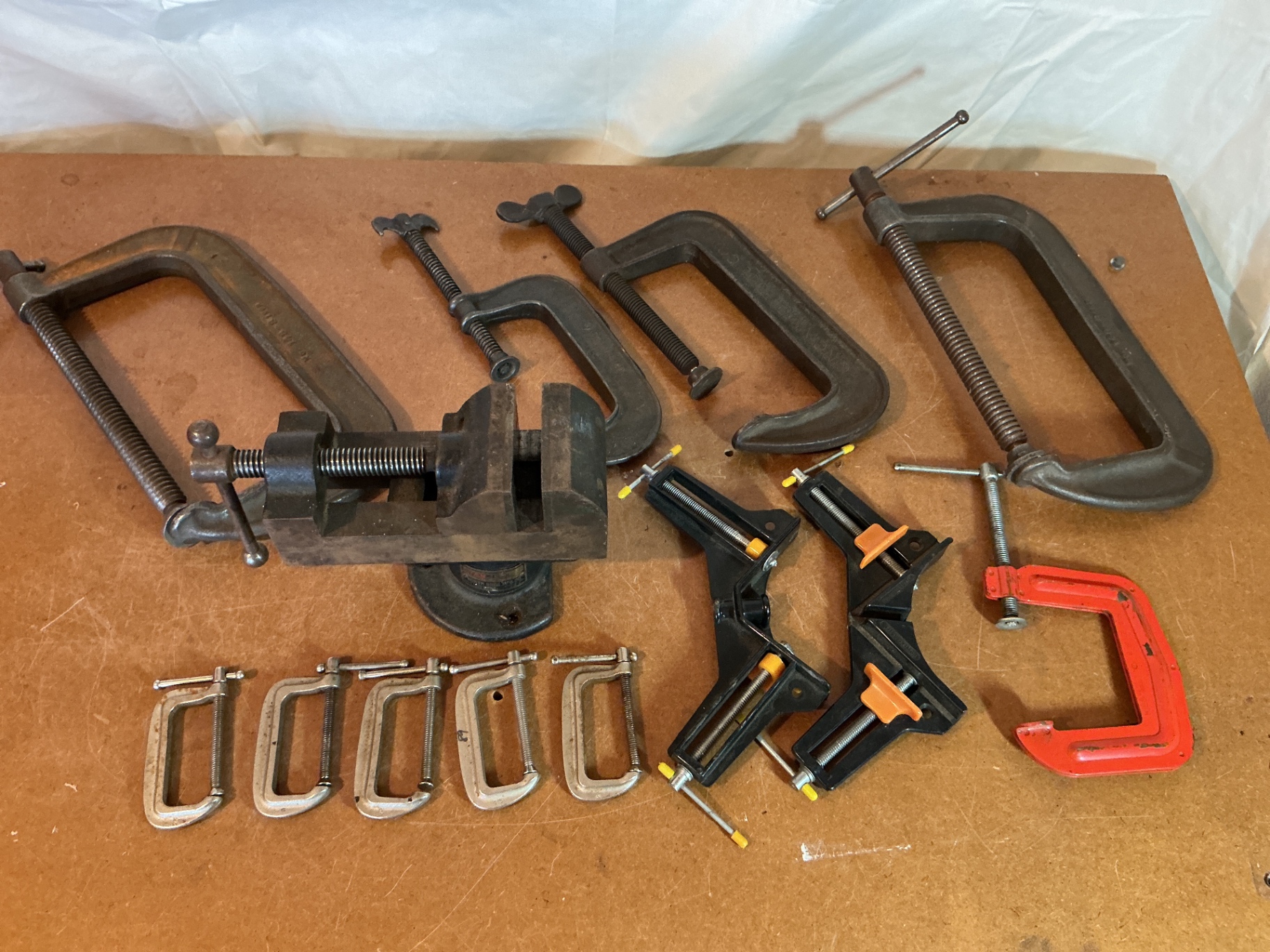 Assorted vintage woodworking clamps and bench vise - image 1 of 7
