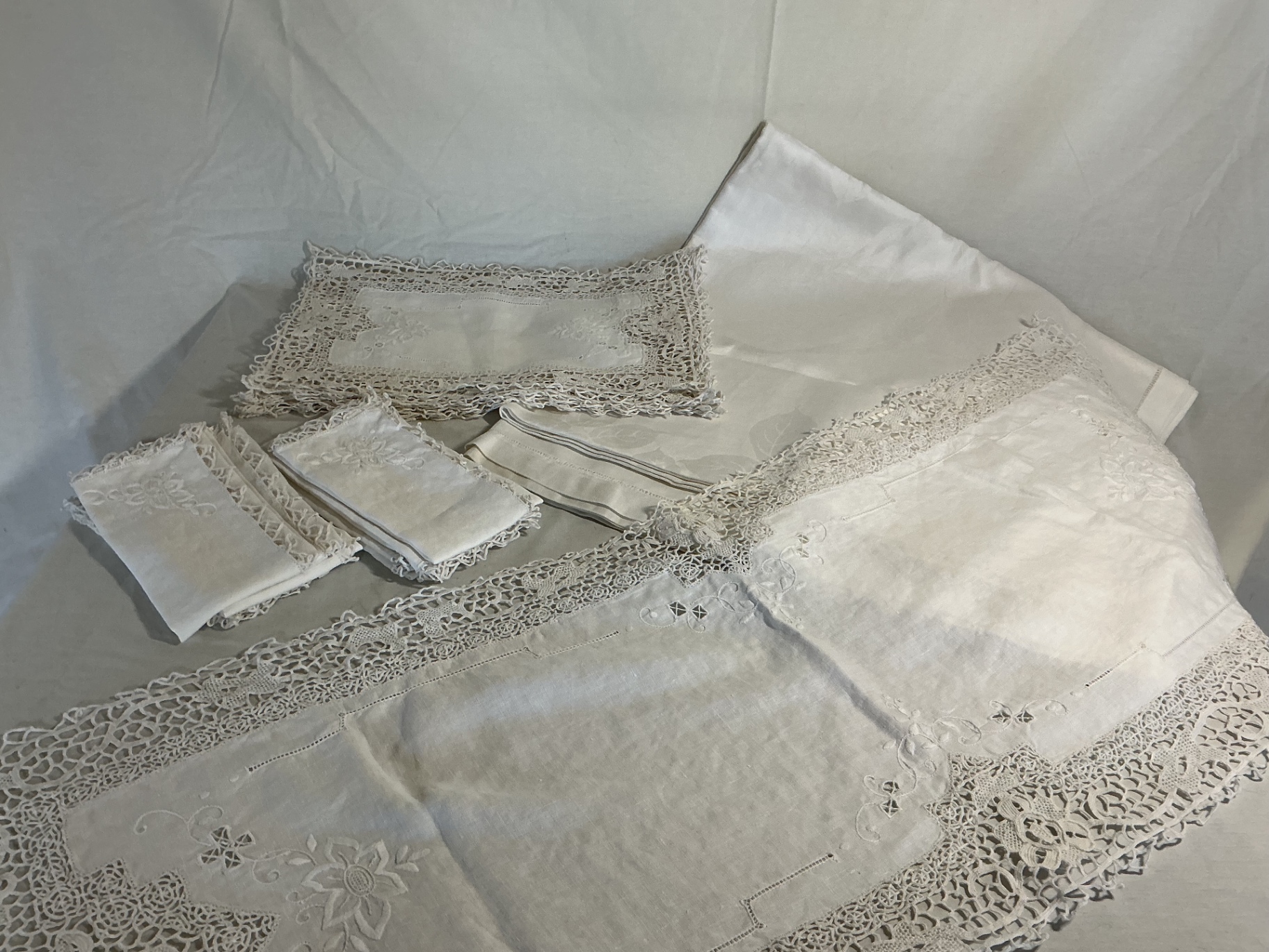 Vintage white embroidered linen tablecloth with lace trim and matching napkins - image 1 of 5