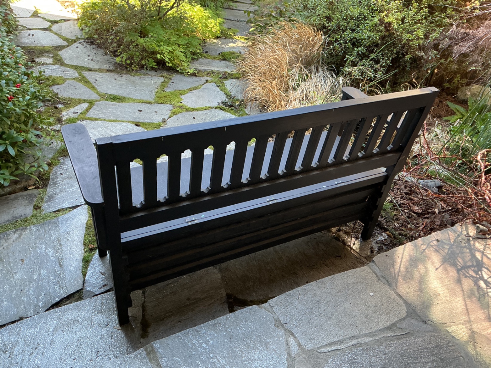 Black outdoor storage bench. - image 3 of 3