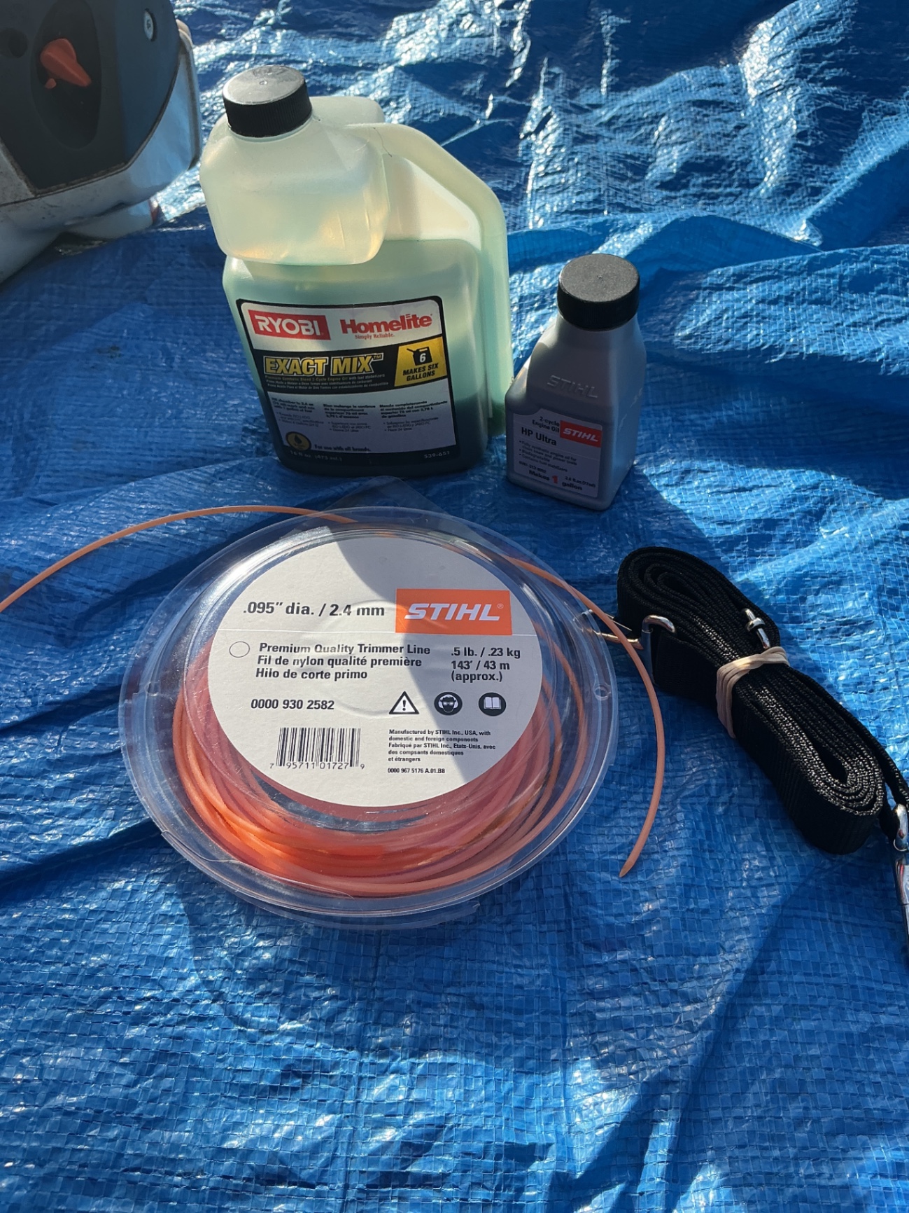 Stihl FS 56 RC string trimmer with fuel, line spool, and weed burner components - image 4 of 6