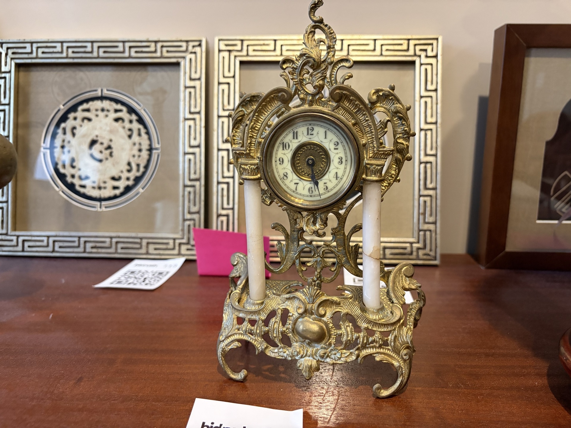 Ornate brass mantel clock with two columns - image 1 of 8