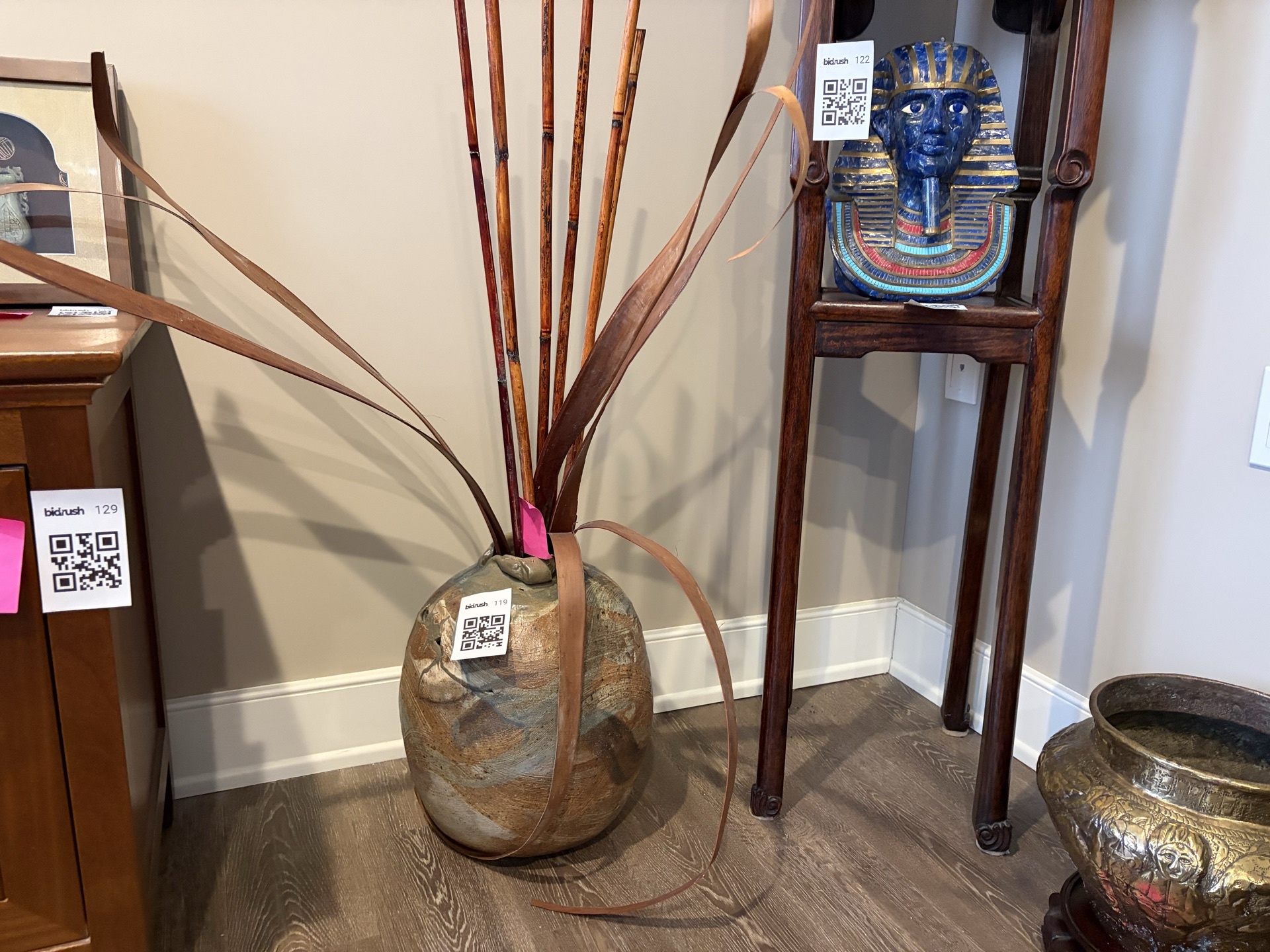 Ceramic vase with dried reeds.  - image 1 of 8