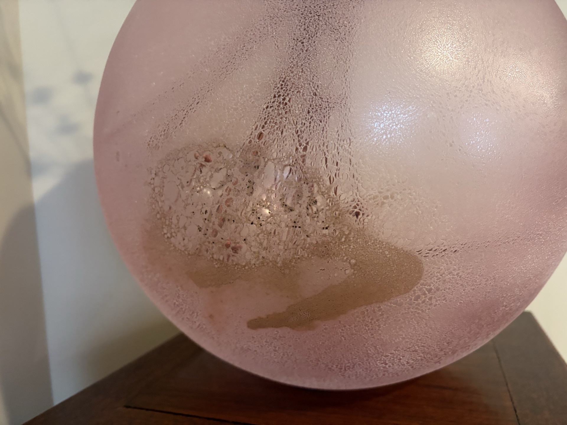 Pink frosted glass sphere vase with twig arrangement - image 3 of 4