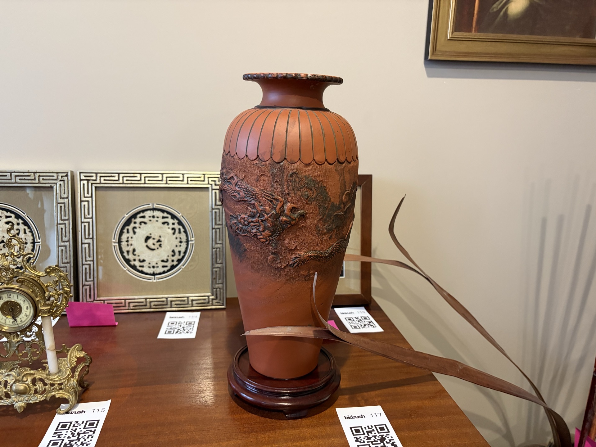 Terracotta vase with dragon relief on wooden stand - image 2 of 9