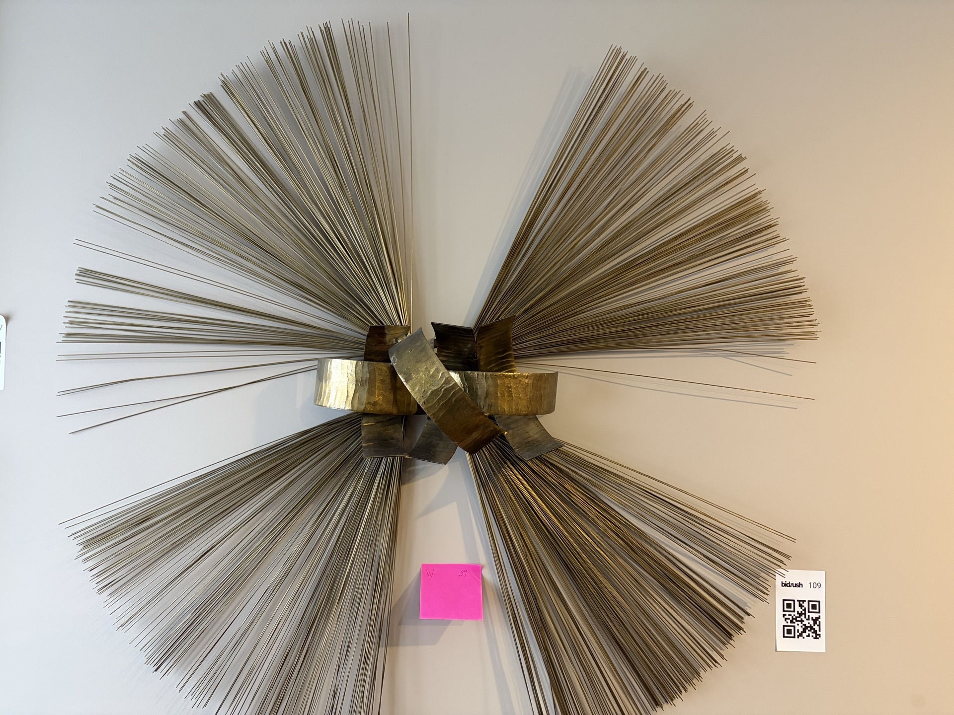 Gold-toned metal sunburst wall sculpture - image 1 of 5