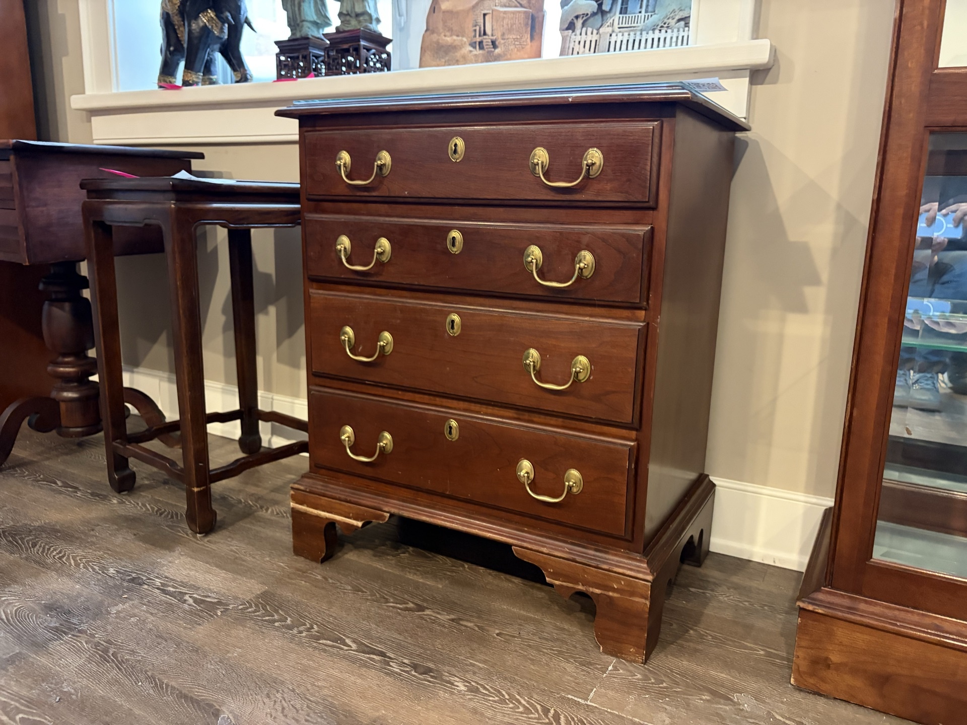 Dark wood five-drawer dresser with brass hardware - image 6 of 7