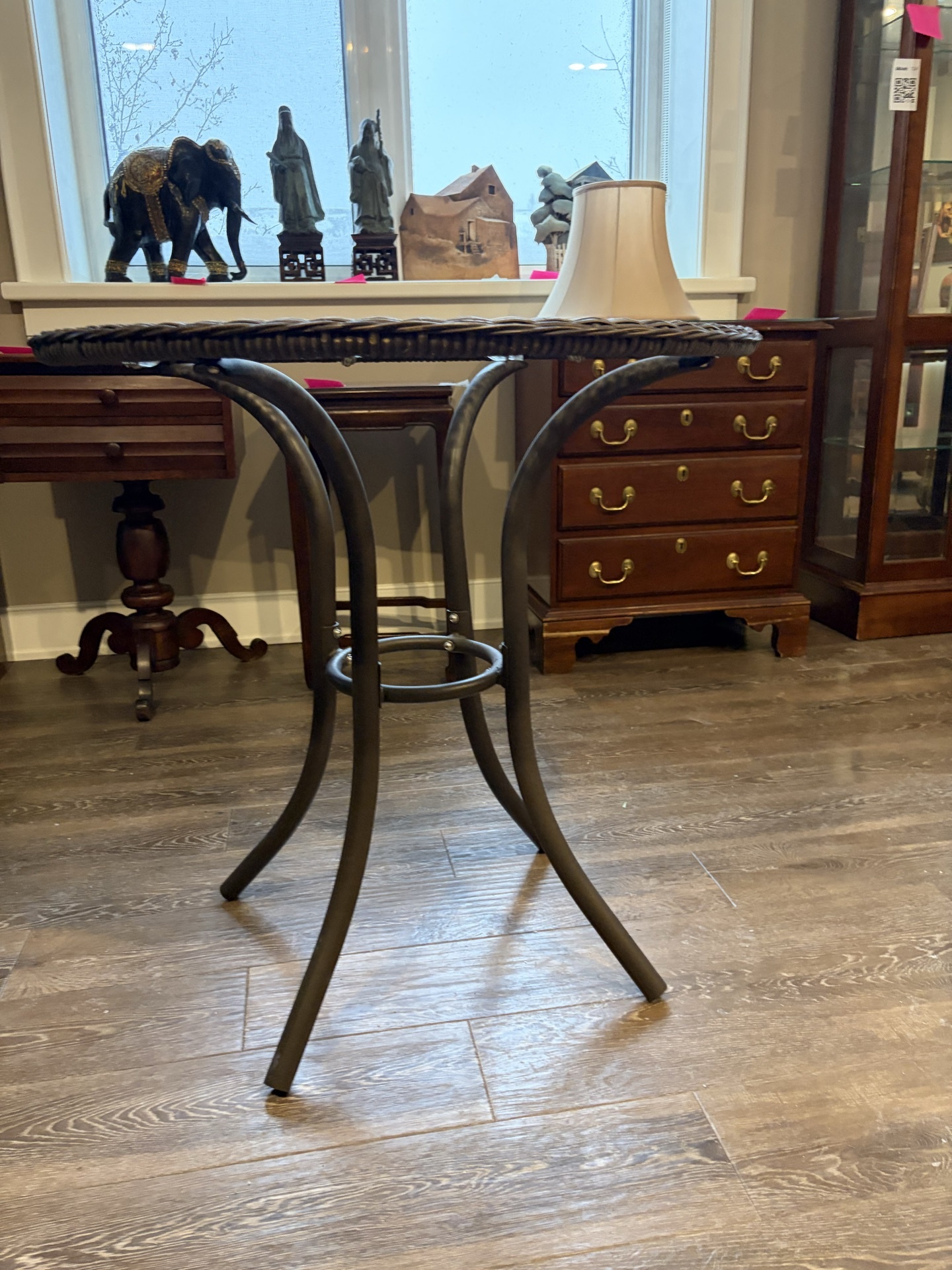 Round wicker-edge glass-top table with curved metal legs - image 4 of 4