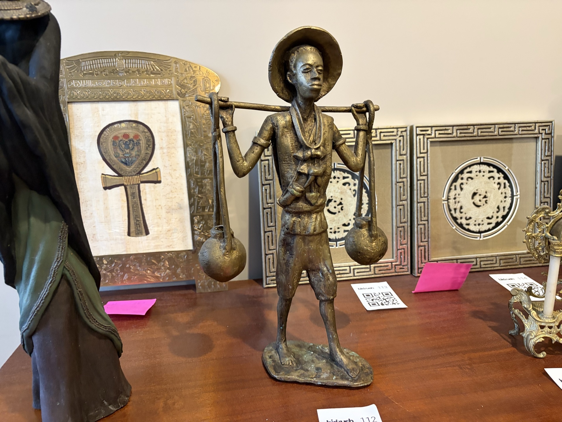 Bronze Statue of a figure carrying a balance scale - image 1 of 9